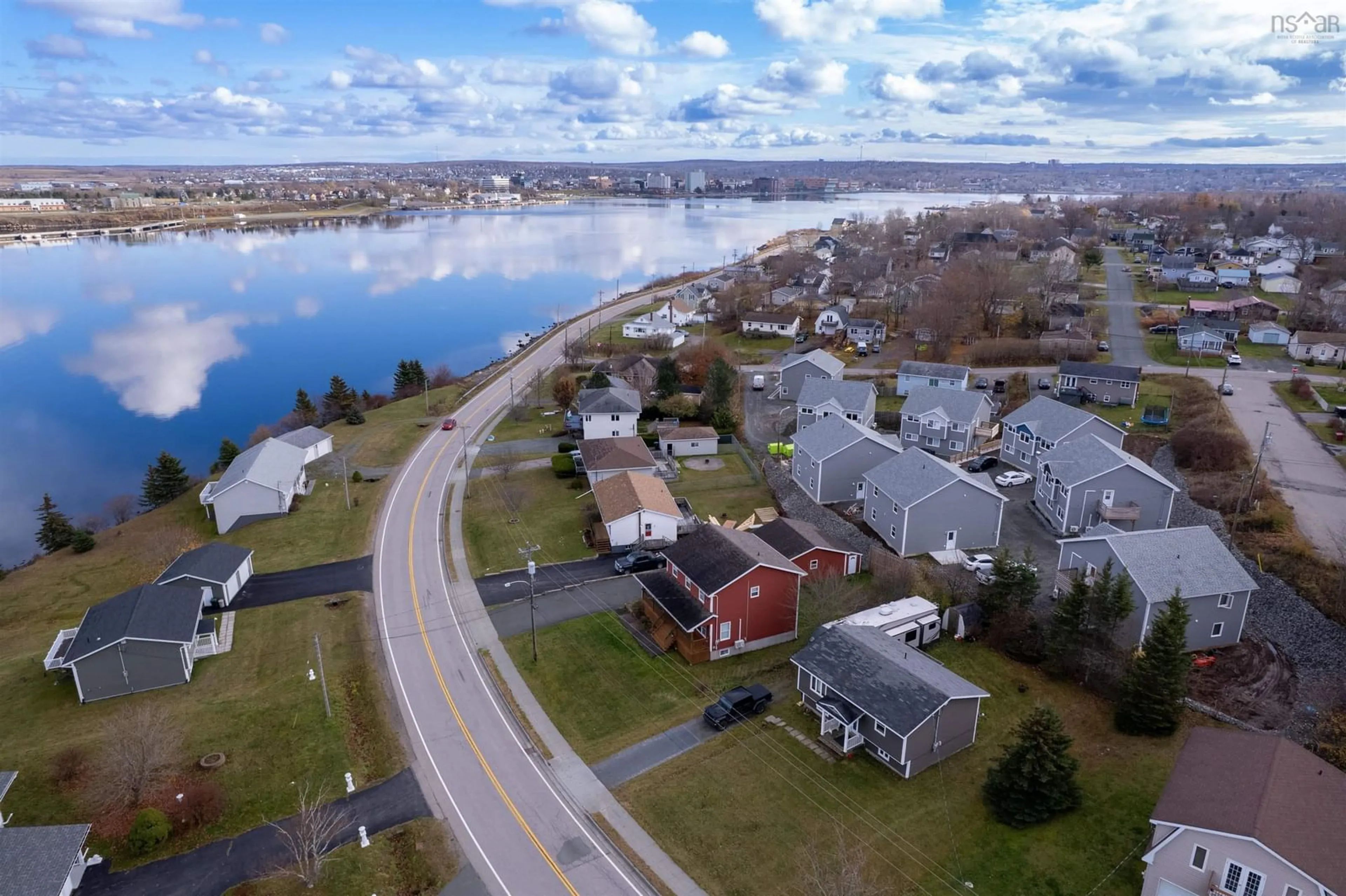 A pic from outside/outdoor area/front of a property/back of a property/a pic from drone, water/lake/river/ocean view for 967 Westmount Rd, Sydney Nova Scotia B1R 1C5