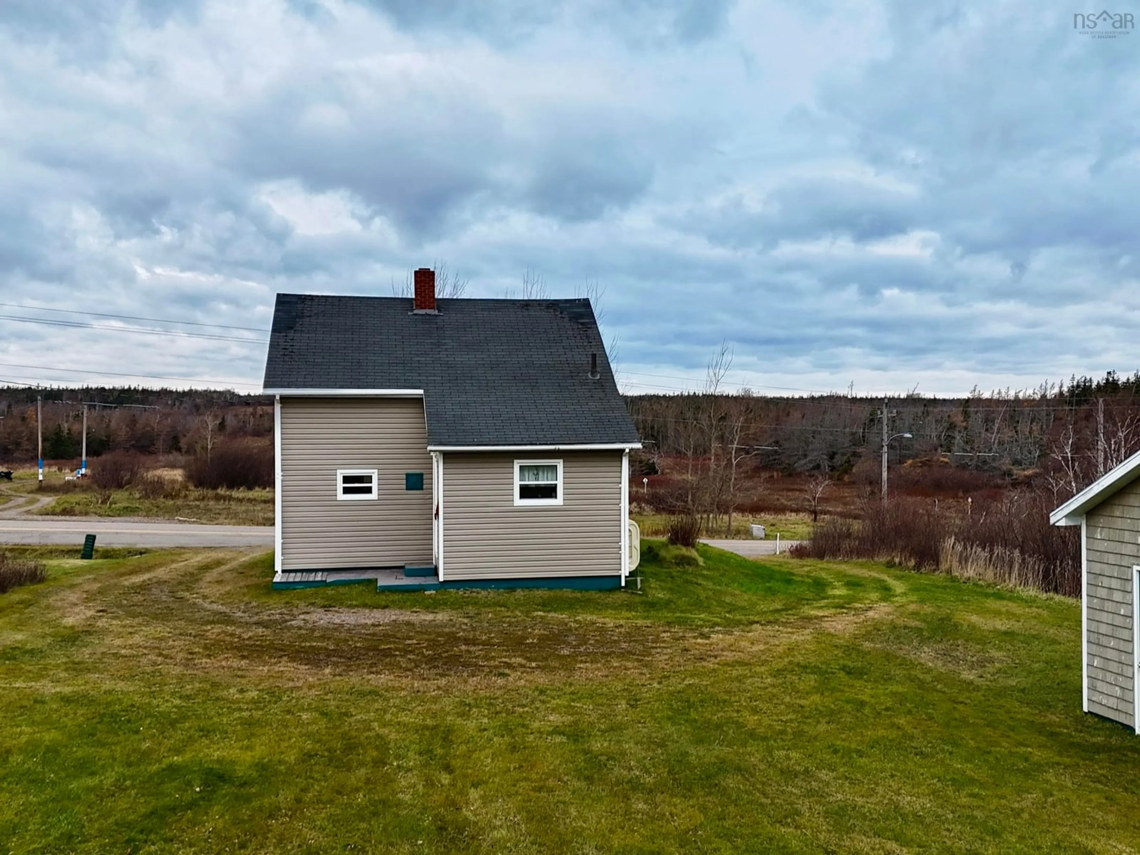 A pic from outside/outdoor area/front of a property/back of a property/a pic from drone, unknown for 1266 Back Road, Chéticamp Nova Scotia B0E 1H0