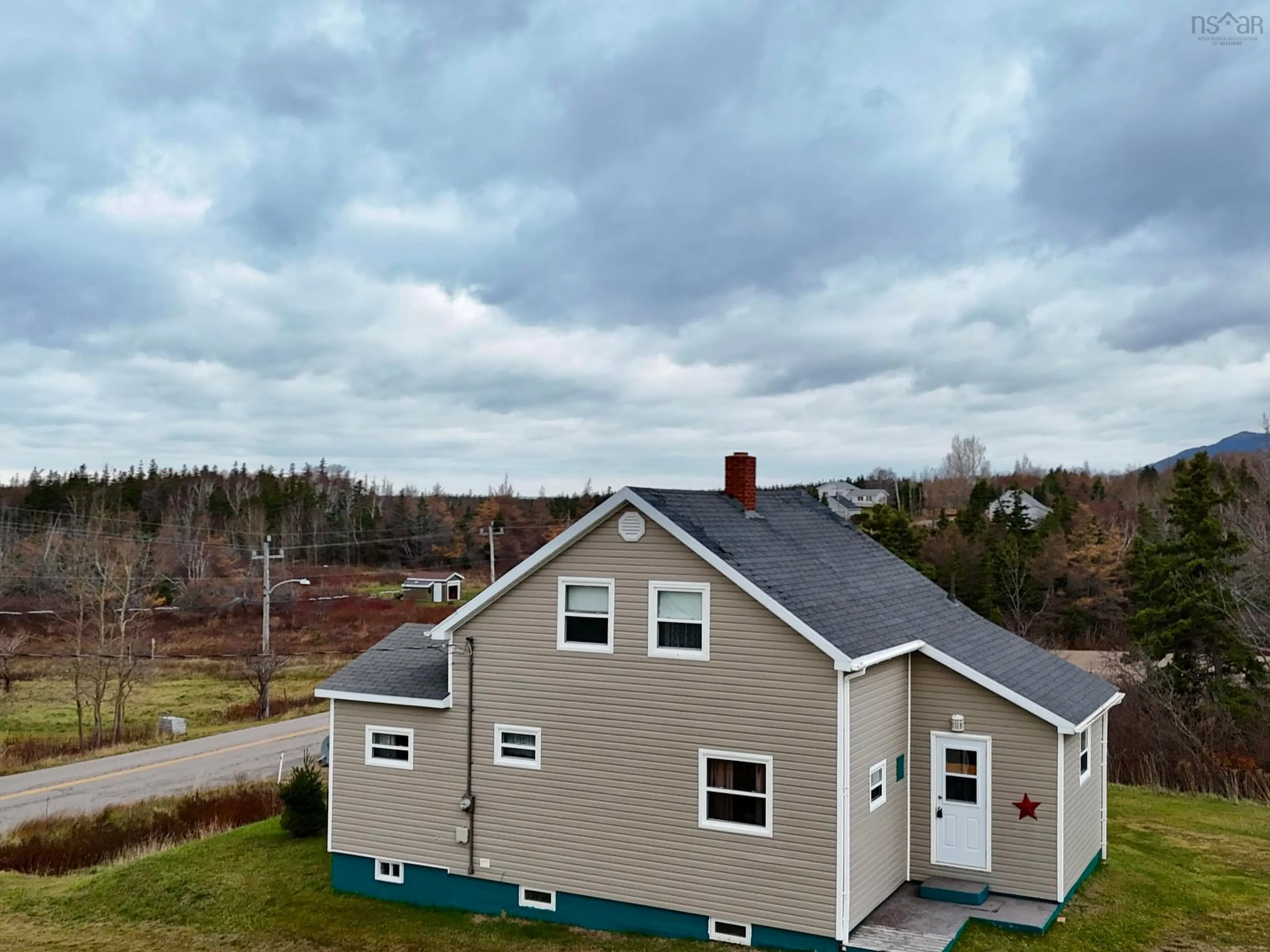 A pic from outside/outdoor area/front of a property/back of a property/a pic from drone, building for 1266 Back Road, Chéticamp Nova Scotia B0E 1H0