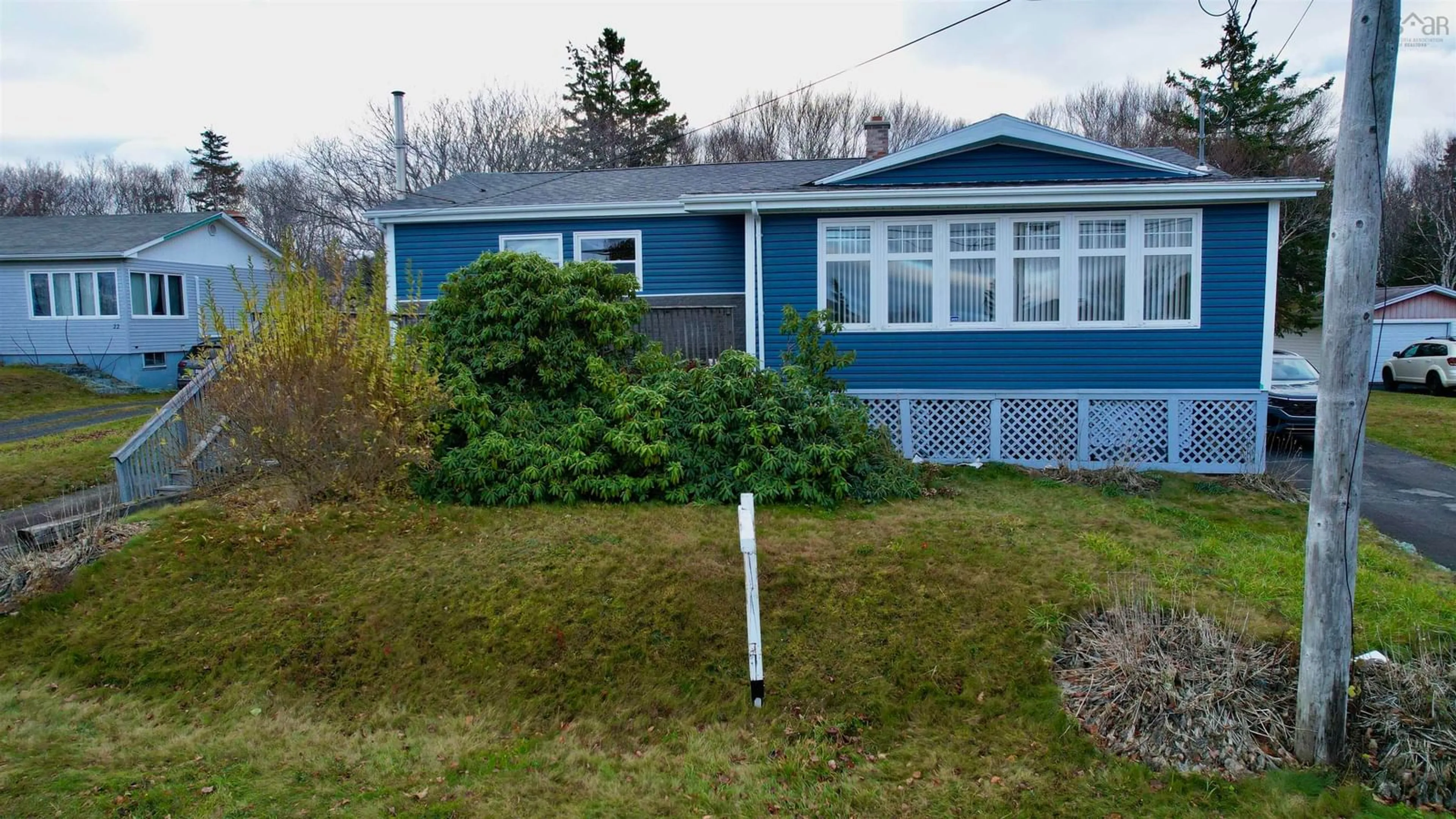 Home with vinyl exterior material, street for 18 Avalon Cres, Glace Bay Nova Scotia B1A 1X4