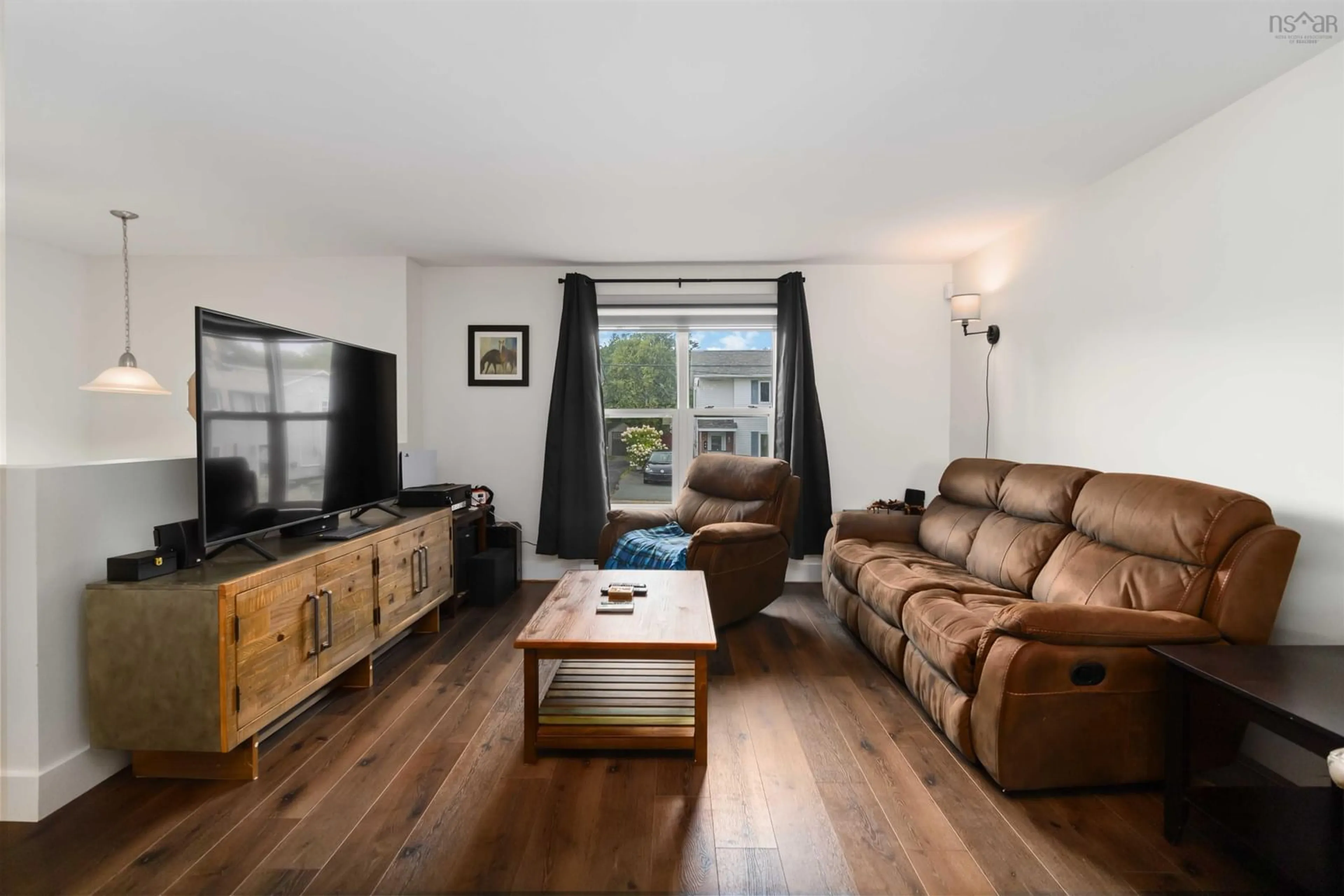 Living room with furniture, wood/laminate floor for 43 Cider Maple Dr, Timberlea Nova Scotia B3T 1K8