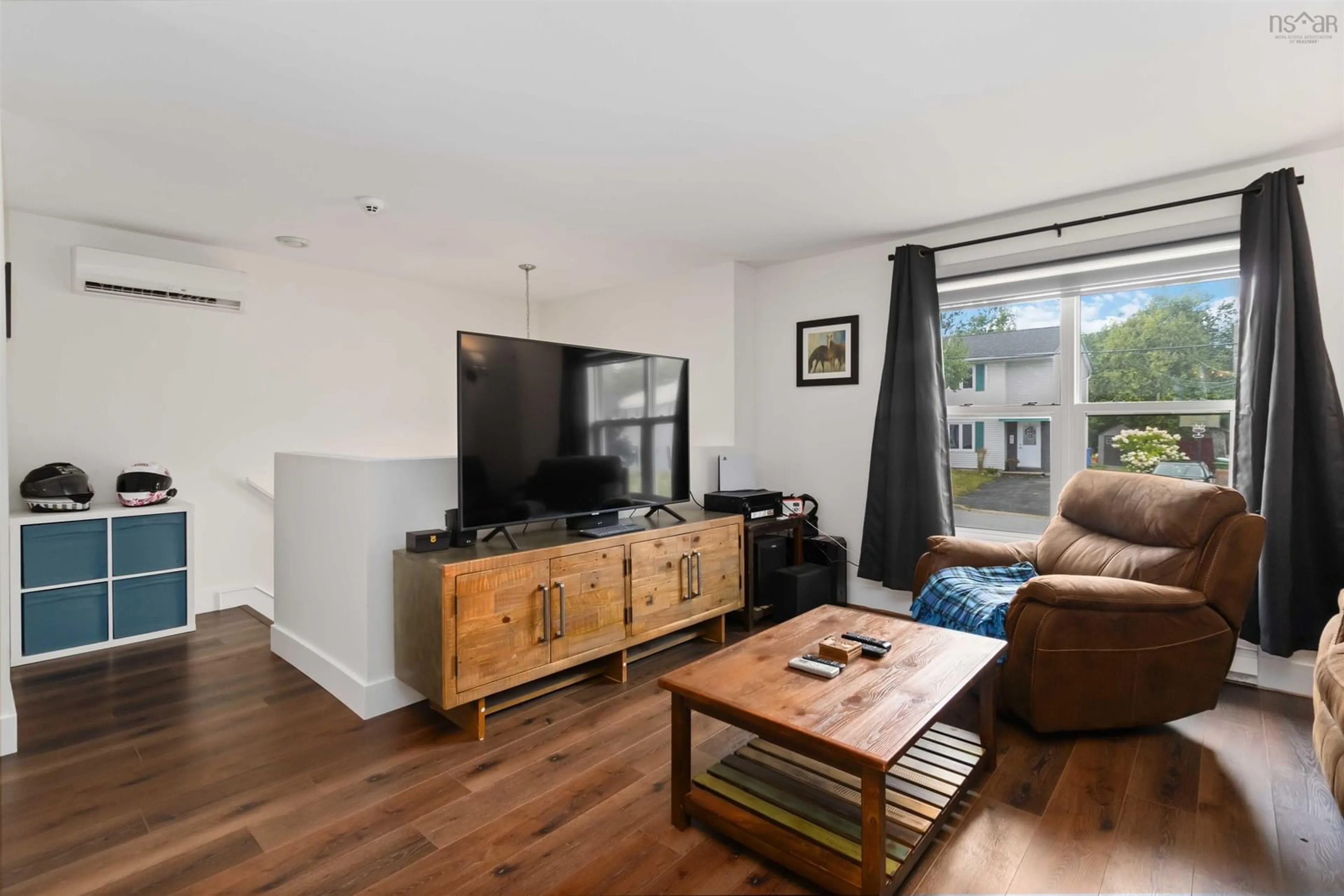 Living room with furniture, wood/laminate floor for 43 Cider Maple Dr, Timberlea Nova Scotia B3T 1K8