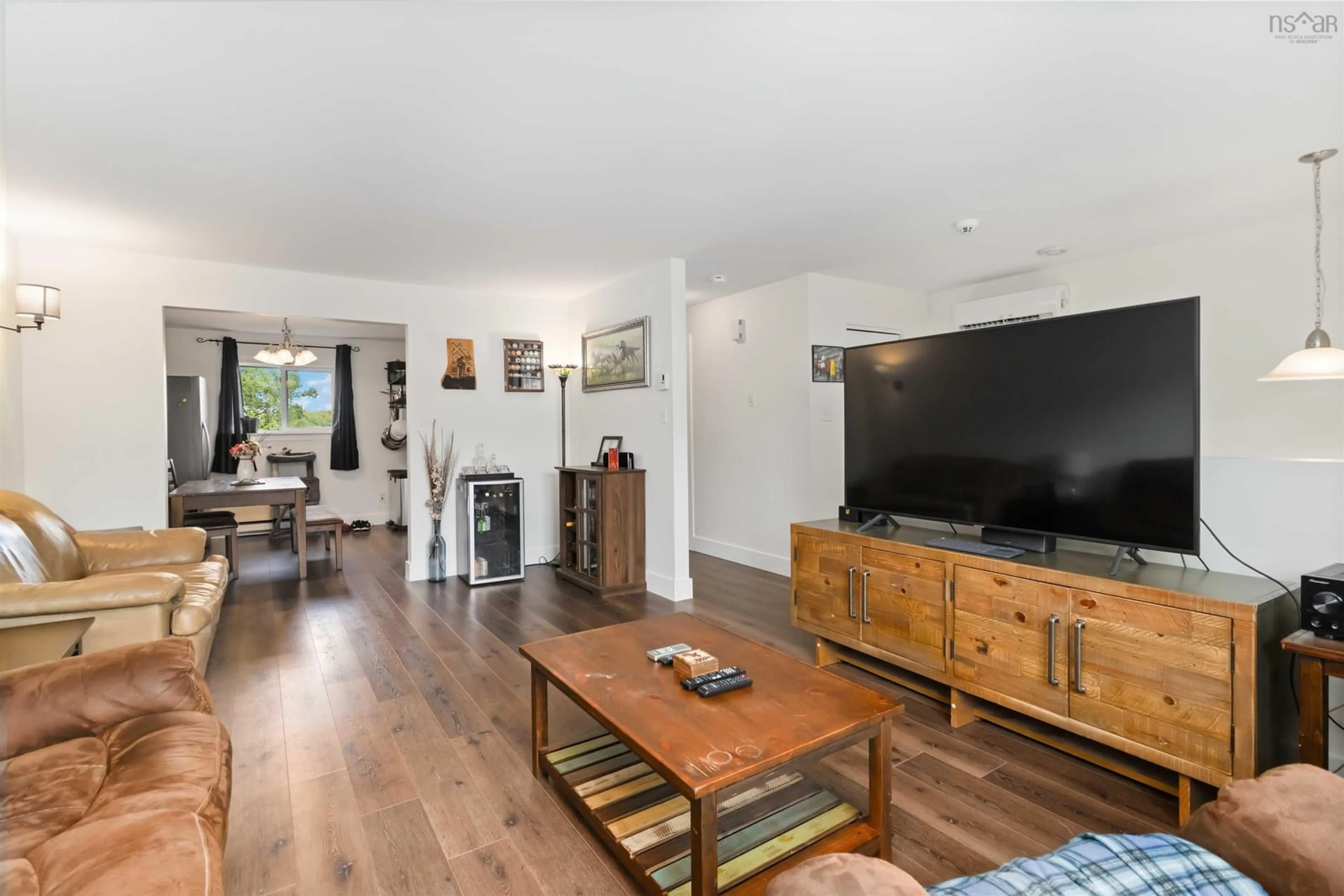 Living room with furniture, wood/laminate floor for 43 Cider Maple Dr, Timberlea Nova Scotia B3T 1K8