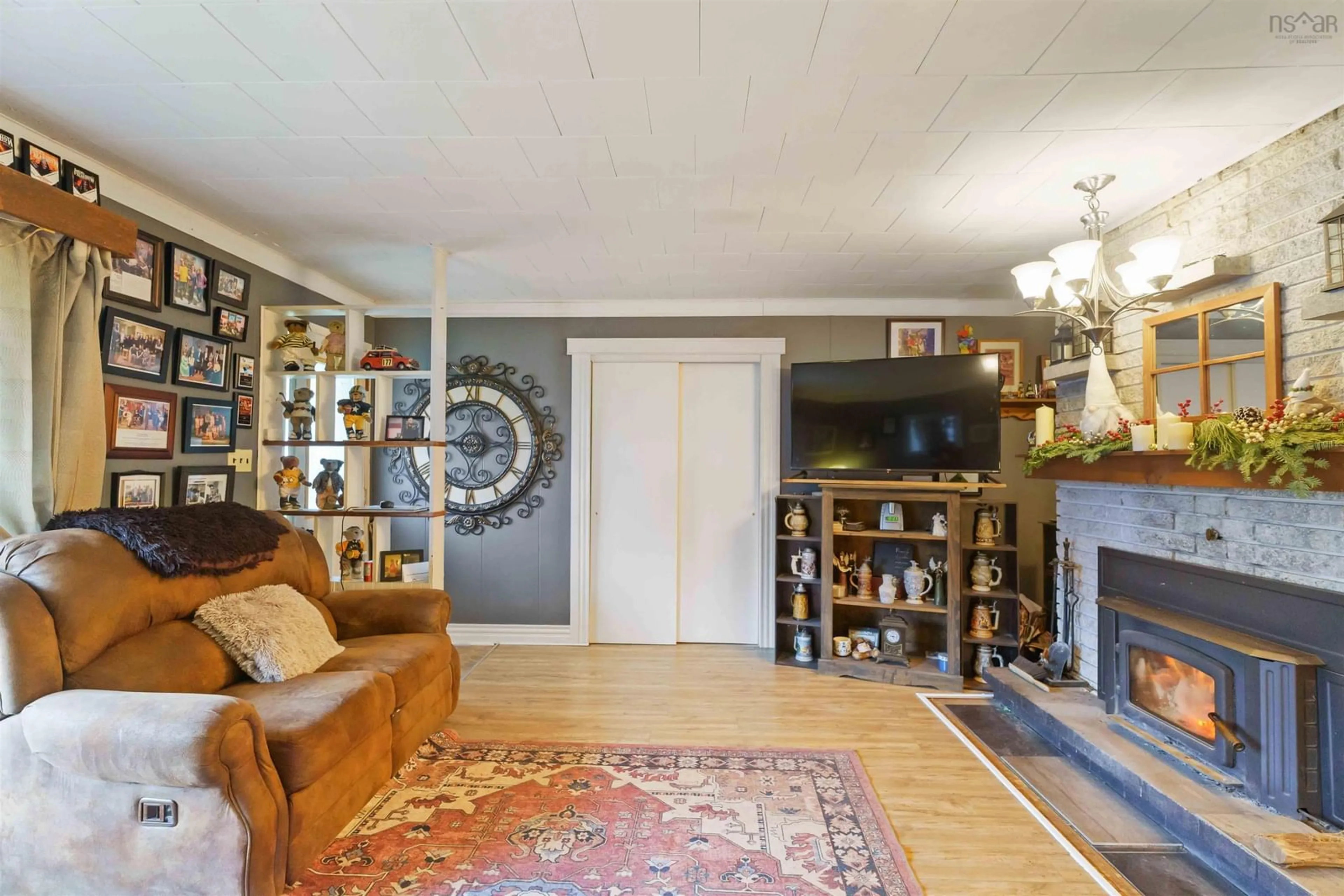 Living room with furniture, wood/laminate floor for 182 Canaan Ave, Kentville Nova Scotia B4N 2B1