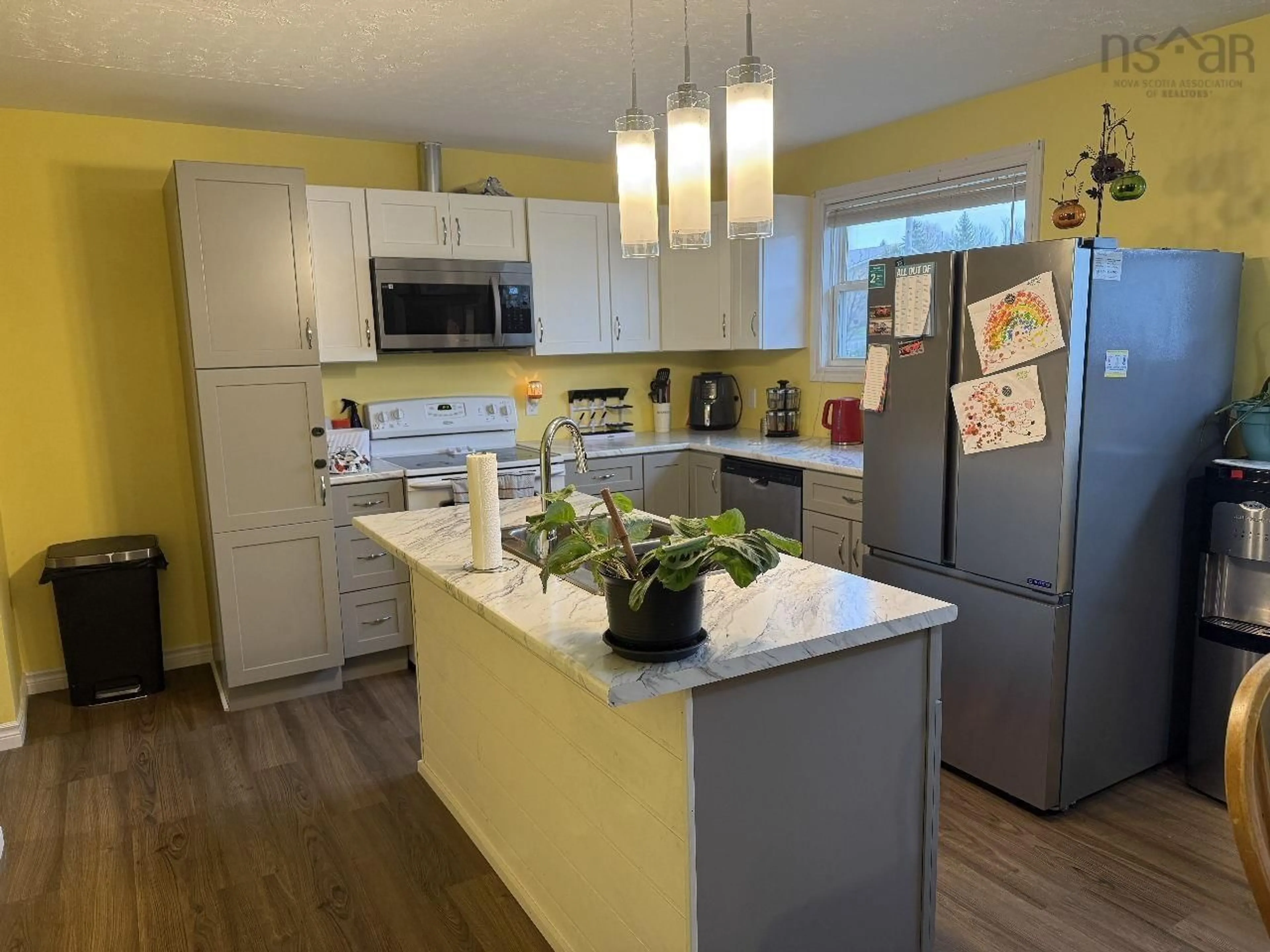 Open concept kitchen, wood/laminate floor for 2858 2 Hwy, Shubenacadie Nova Scotia B0N 2H0