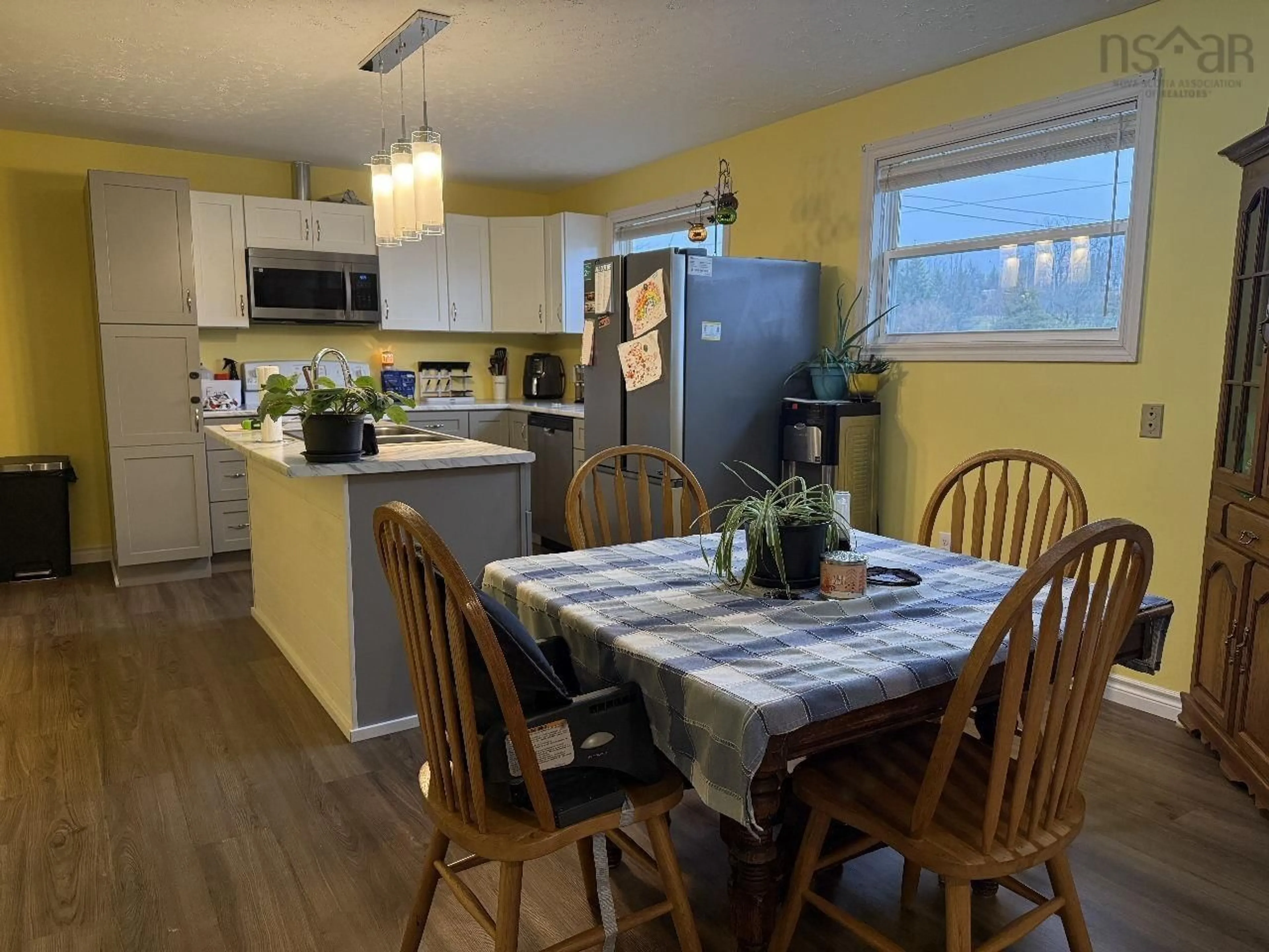 Open concept kitchen, wood/laminate floor for 2858 2 Hwy, Shubenacadie Nova Scotia B0N 2H0