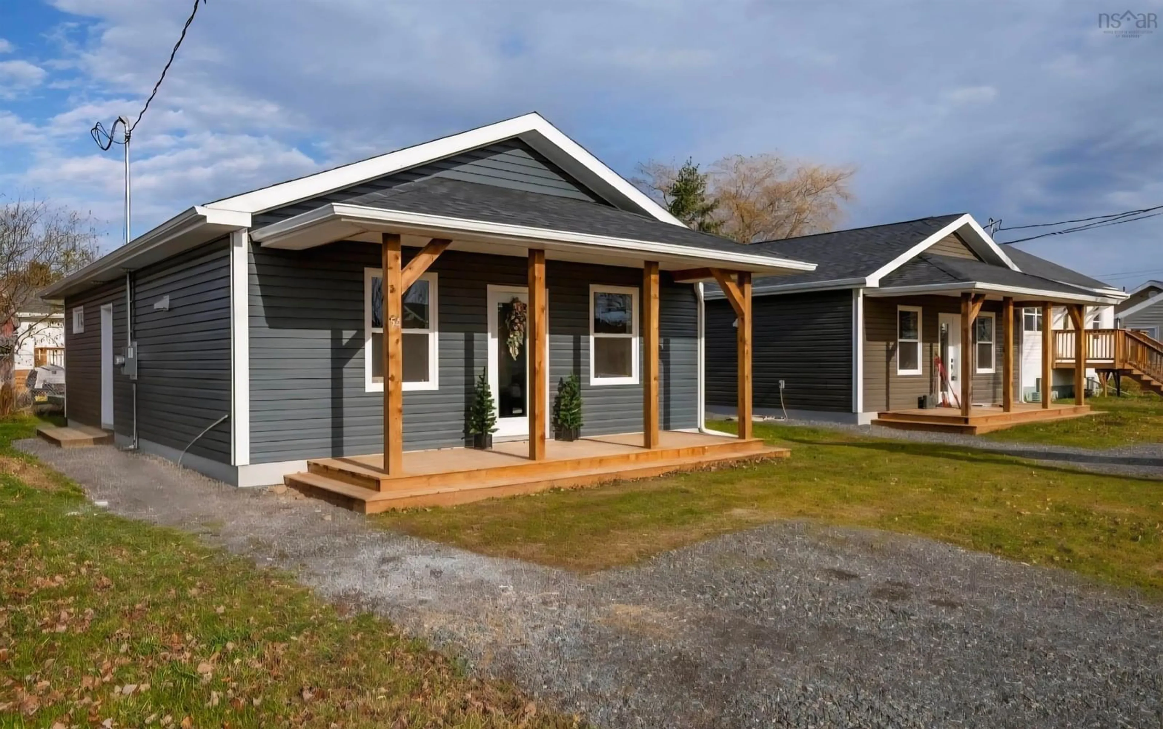 Home with vinyl exterior material, street for 54 Oak St, Pictou Nova Scotia B0K 1H0