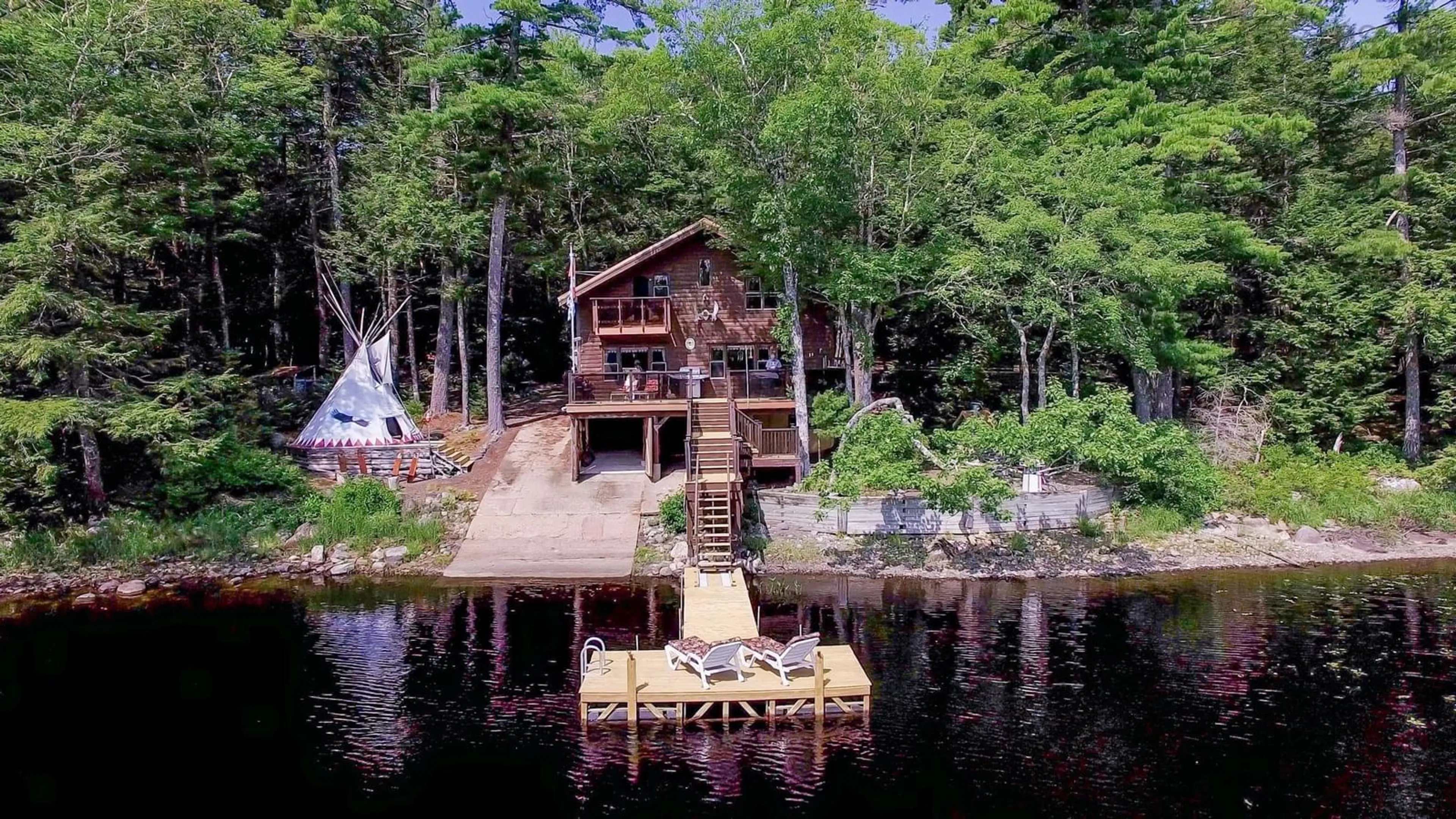 A pic from outside/outdoor area/front of a property/back of a property/a pic from drone, water/lake/river/ocean view for 491 Peters Point Rd, South Brookfield Nova Scotia B0T 1X0