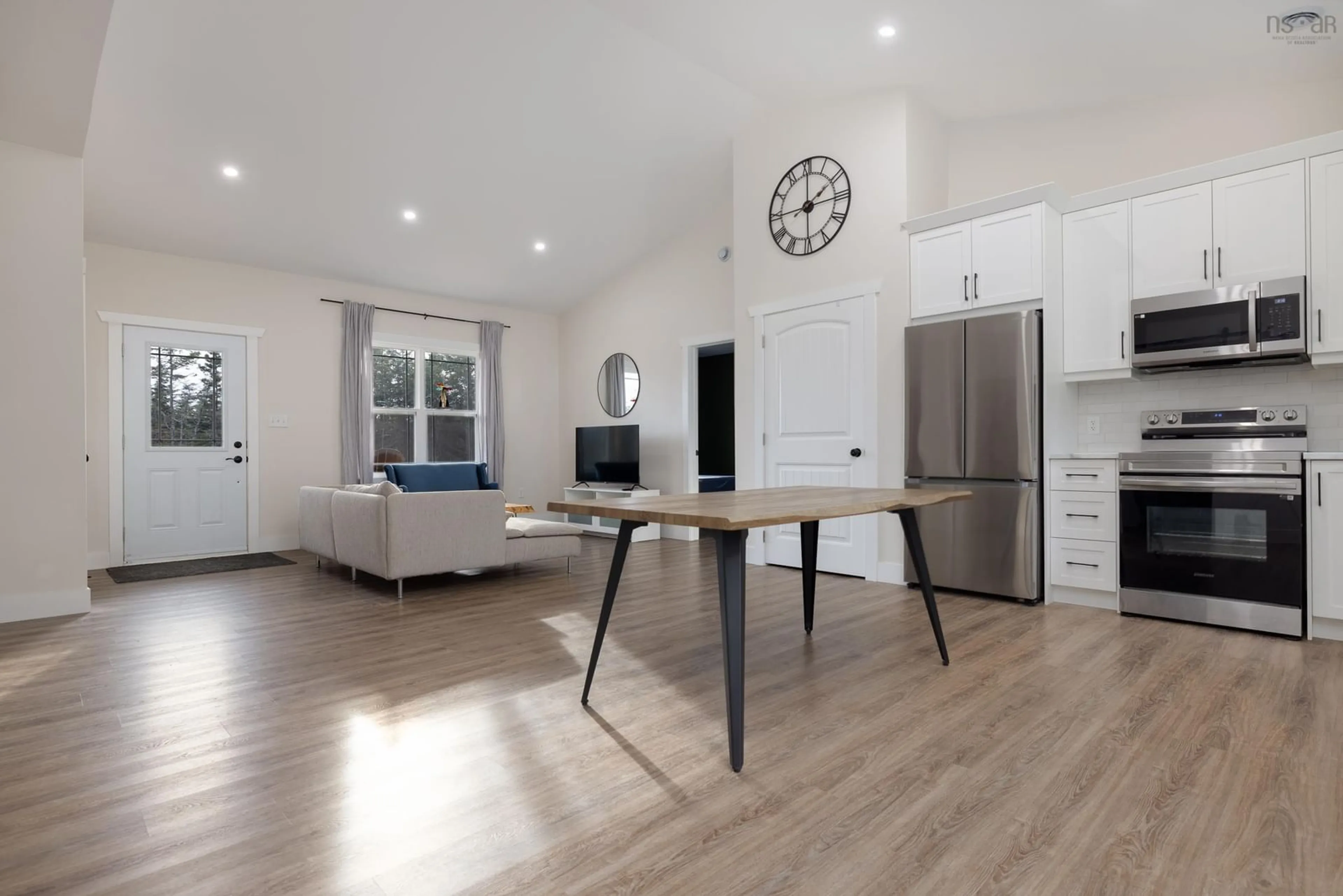 Open concept kitchen, wood/laminate floor for 101 English Point Rd, Myers Point Nova Scotia B0J 1P0