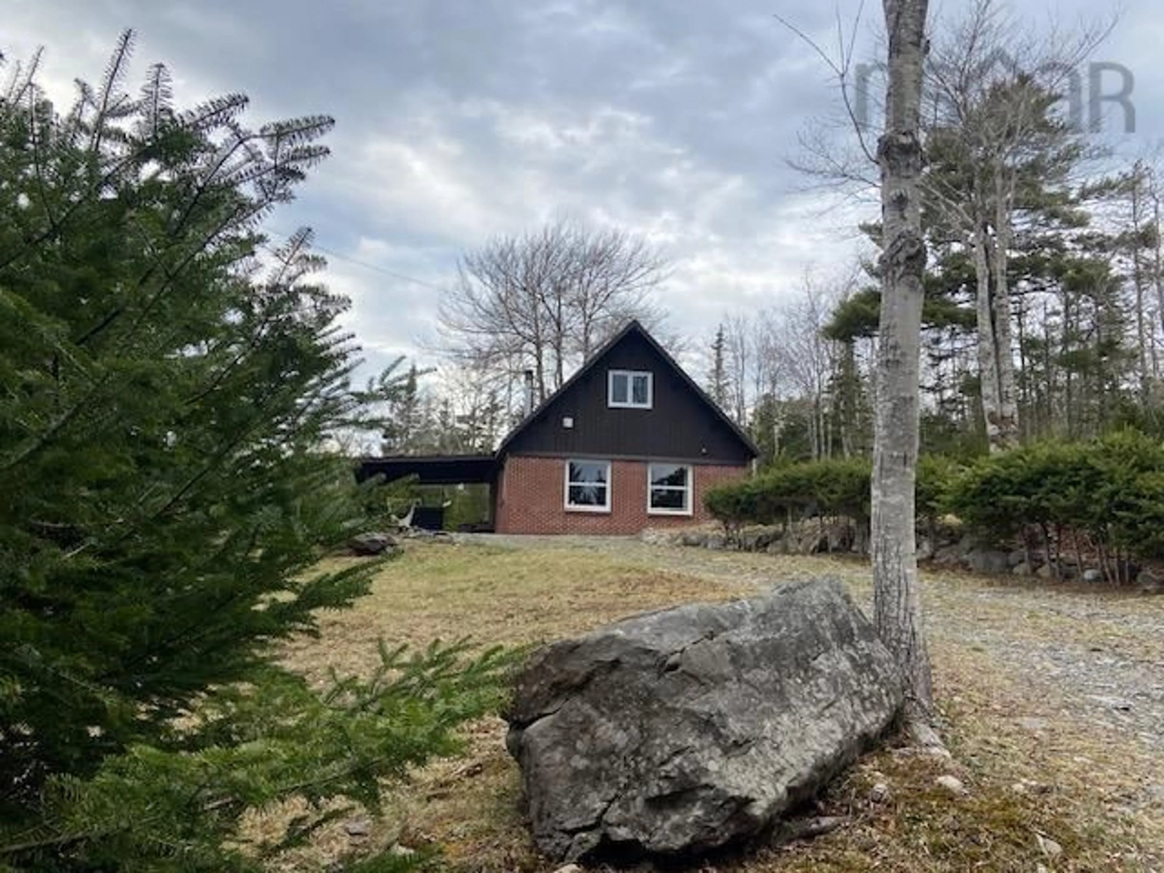 A pic from outside/outdoor area/front of a property/back of a property/a pic from drone, mountain view for 645 East Sable Rd, East Sable River Nova Scotia B0T 1V0