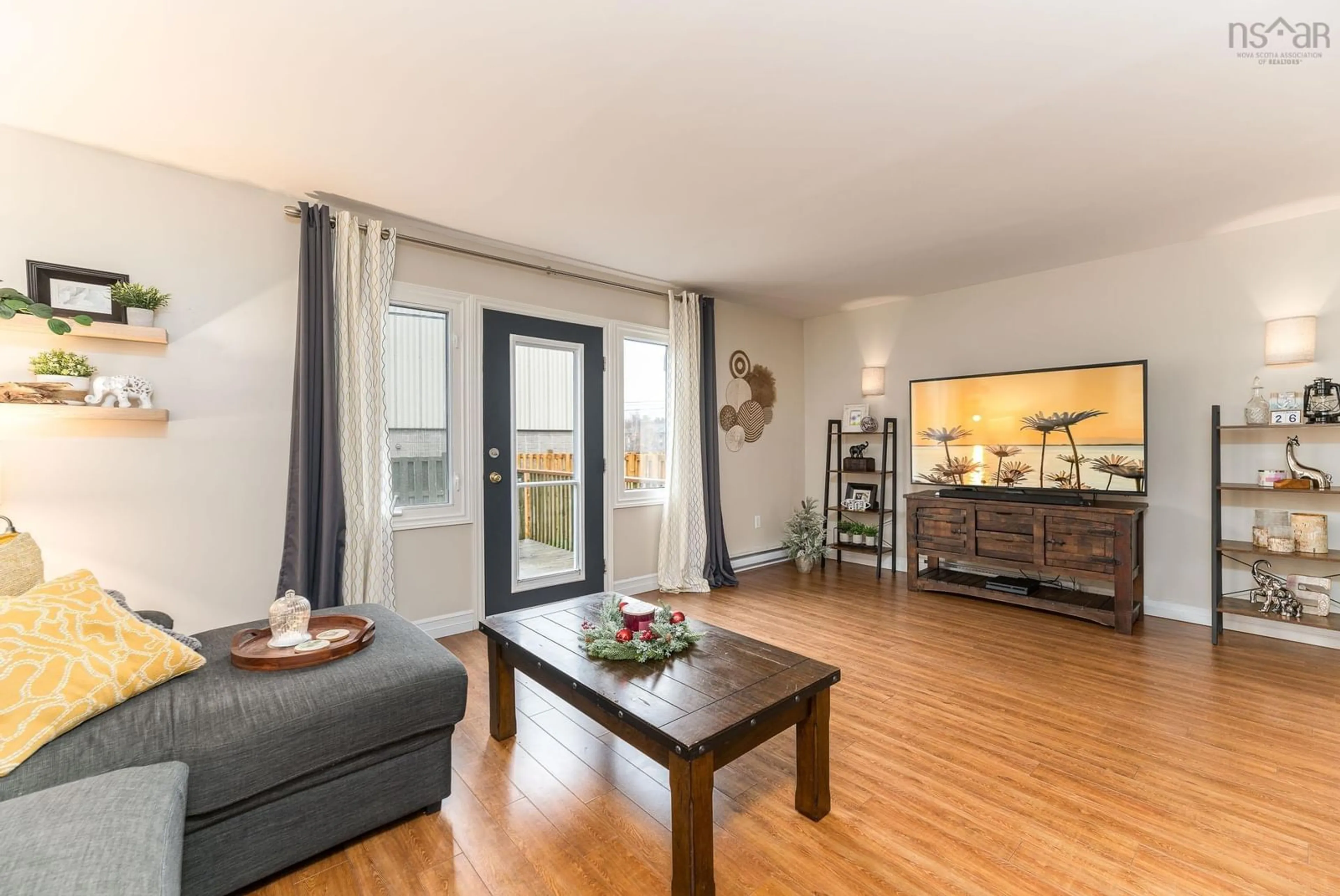 Living room with furniture, wood/laminate floor for 7B Arklow Dr, Dartmouth Nova Scotia B2W 4J6