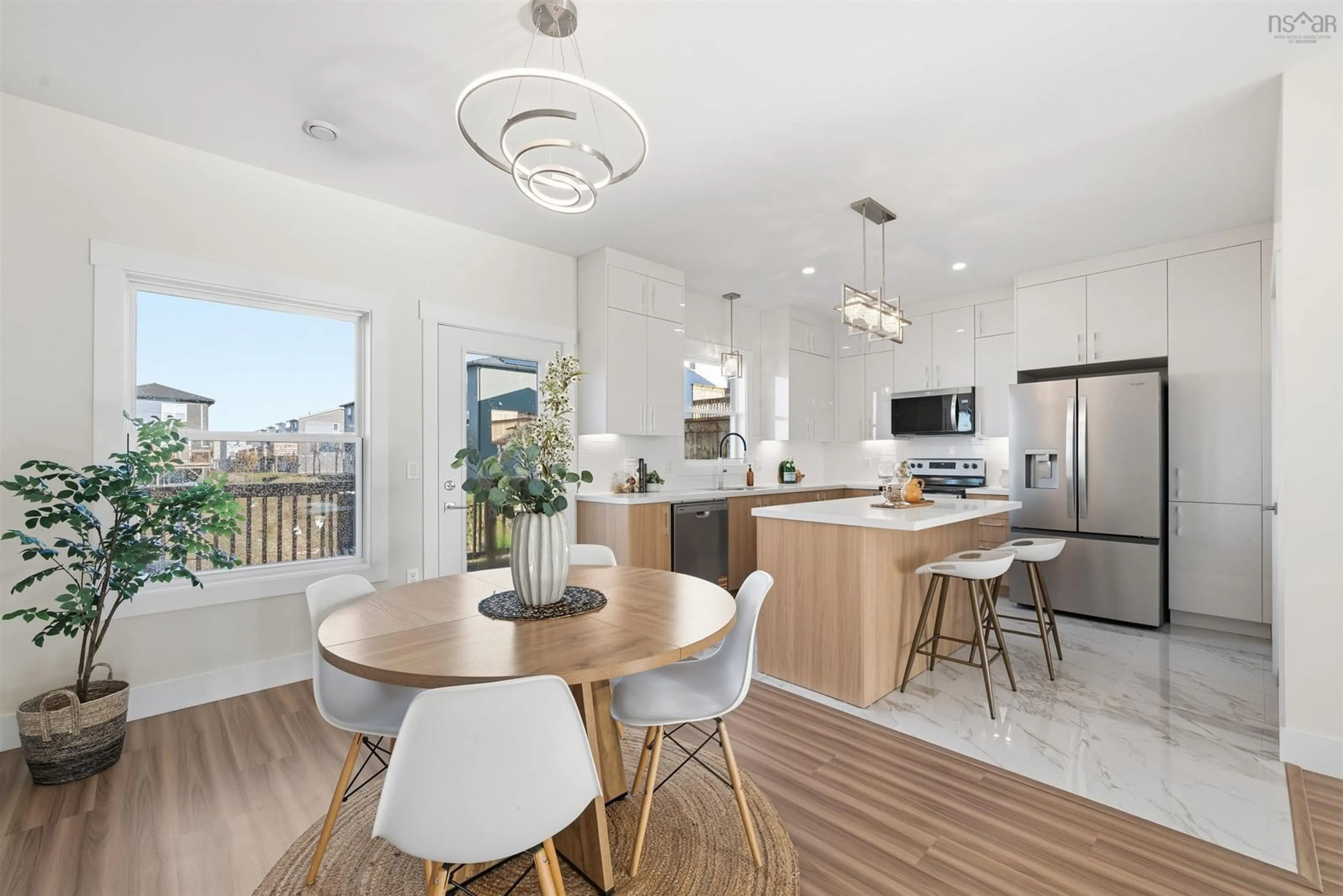 Open concept kitchen, wood/laminate floor for 21 Zeppelin Cres, Beechville Nova Scotia B3T 0B0