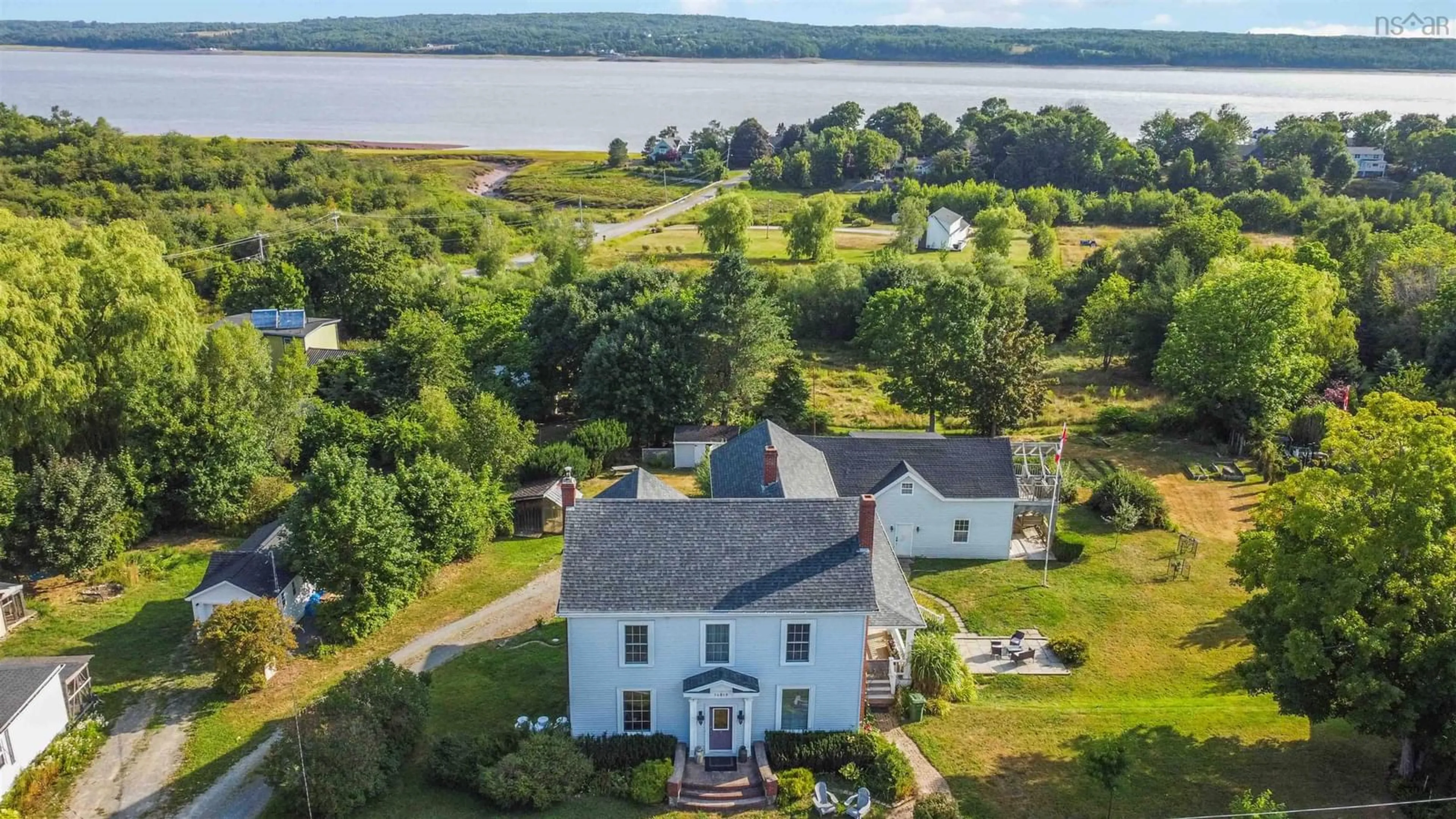 A pic from outside/outdoor area/front of a property/back of a property/a pic from drone, water/lake/river/ocean view for 14019 Highway 1, Hants Border Nova Scotia B0P 1P0