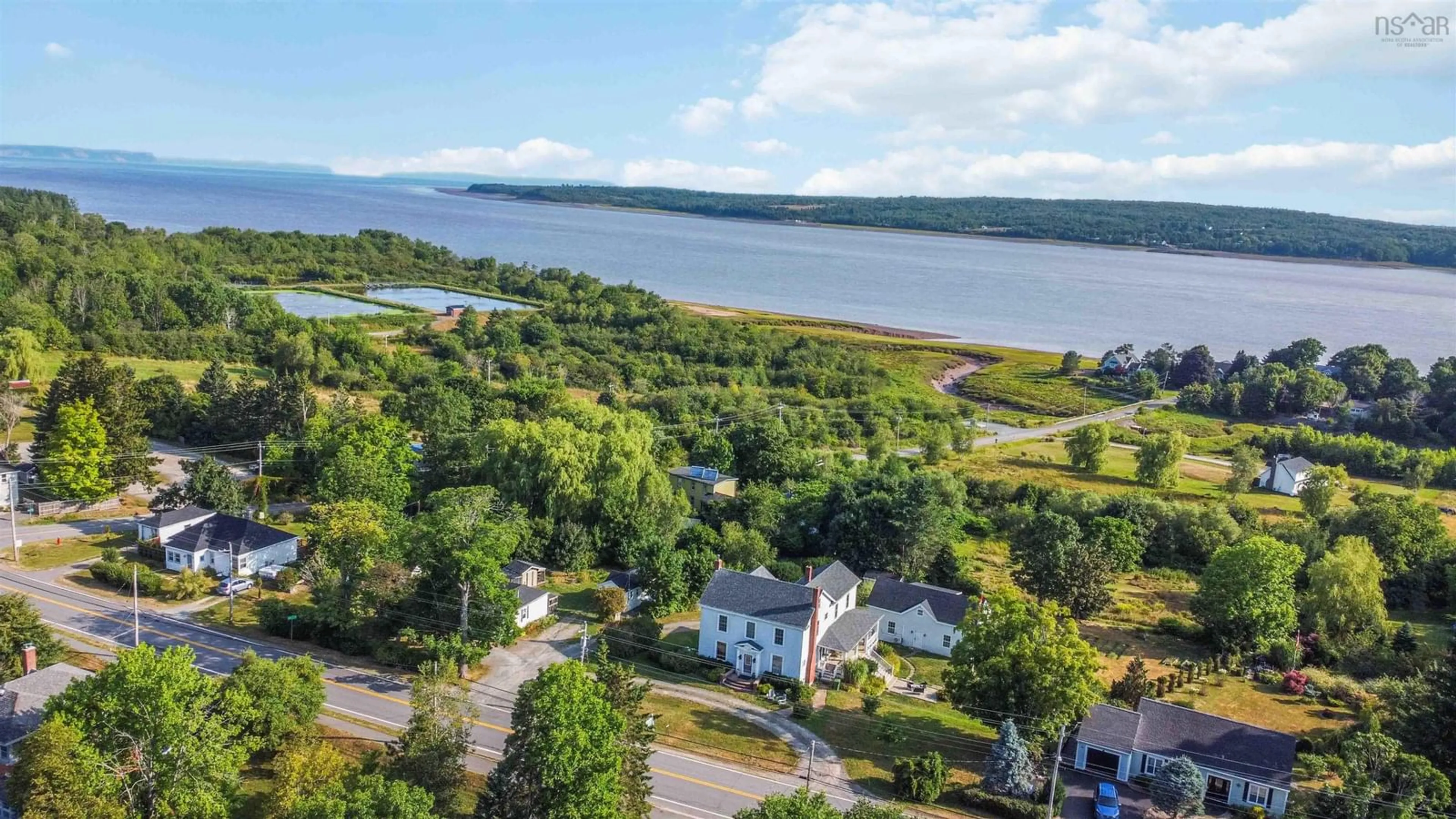 A pic from outside/outdoor area/front of a property/back of a property/a pic from drone, water/lake/river/ocean view for 14019 Highway 1, Hants Border Nova Scotia B0P 1P0