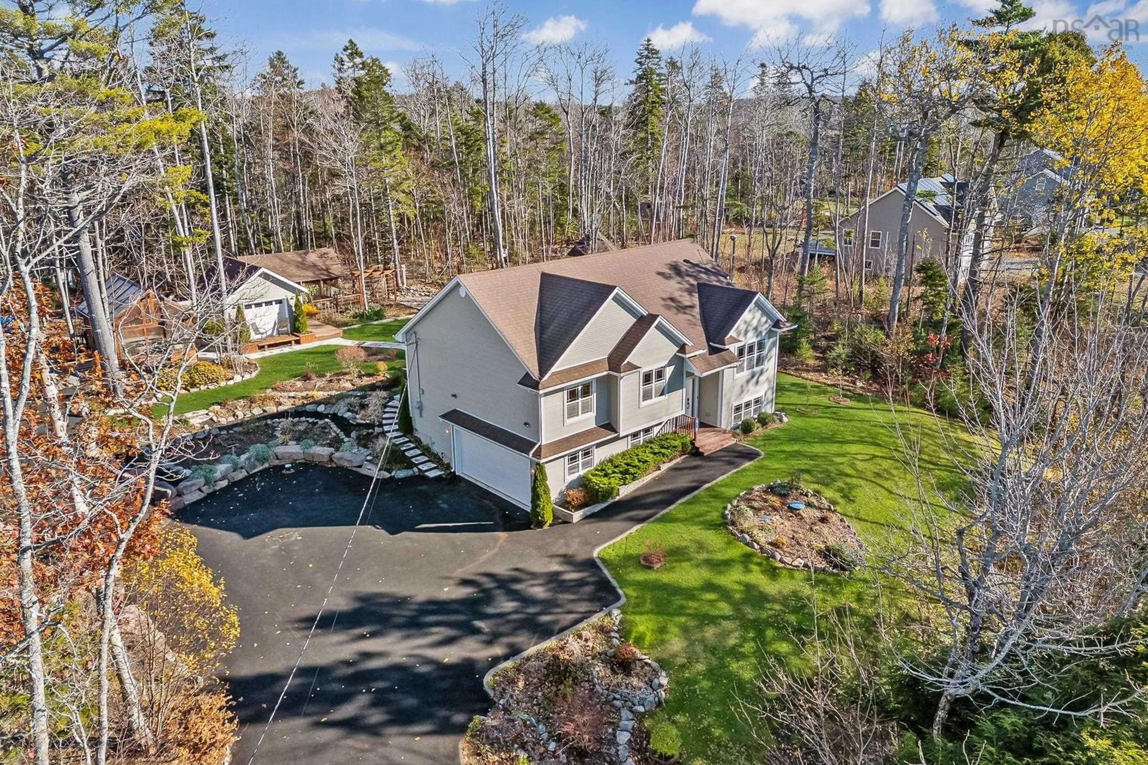 A pic from outside/outdoor area/front of a property/back of a property/a pic from drone, water/lake/river/ocean view for 416 Crooked Stick Pass, Beaver Bank Nova Scotia B4G 0B8