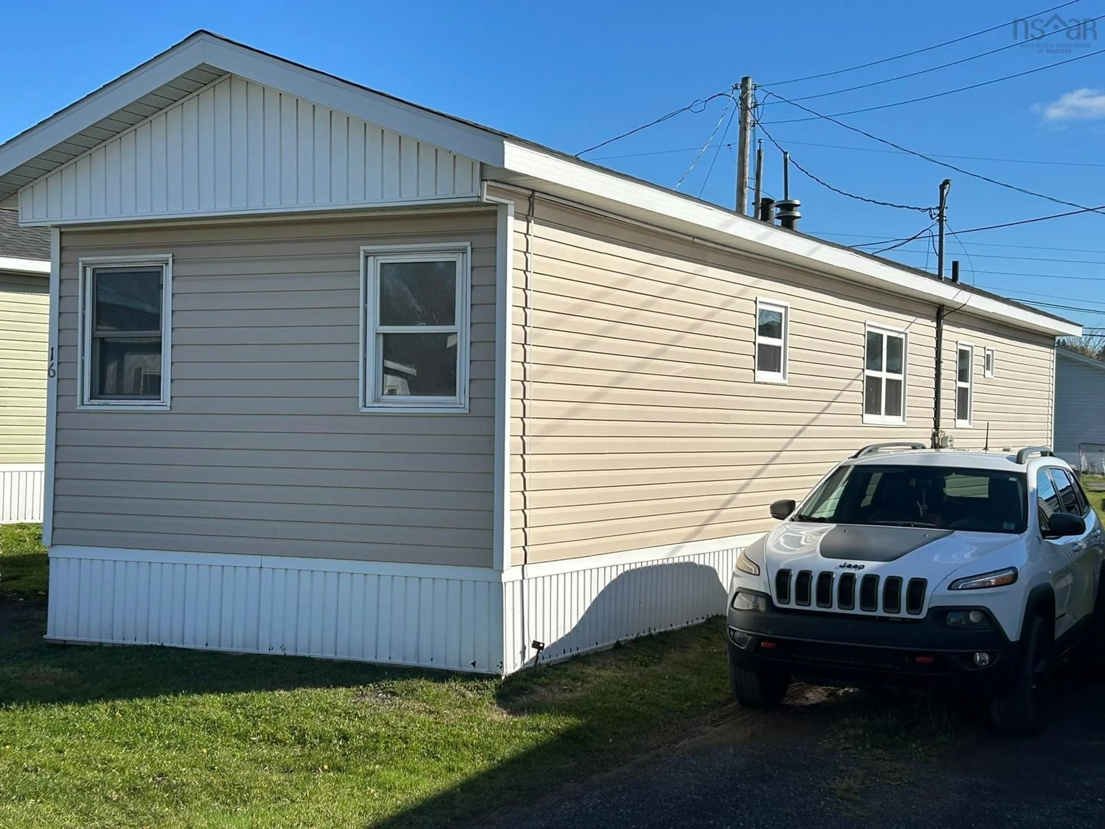 Home with vinyl exterior material, street for 16 Twin River Trailer Court, Stellarton Nova Scotia B0K 1S0