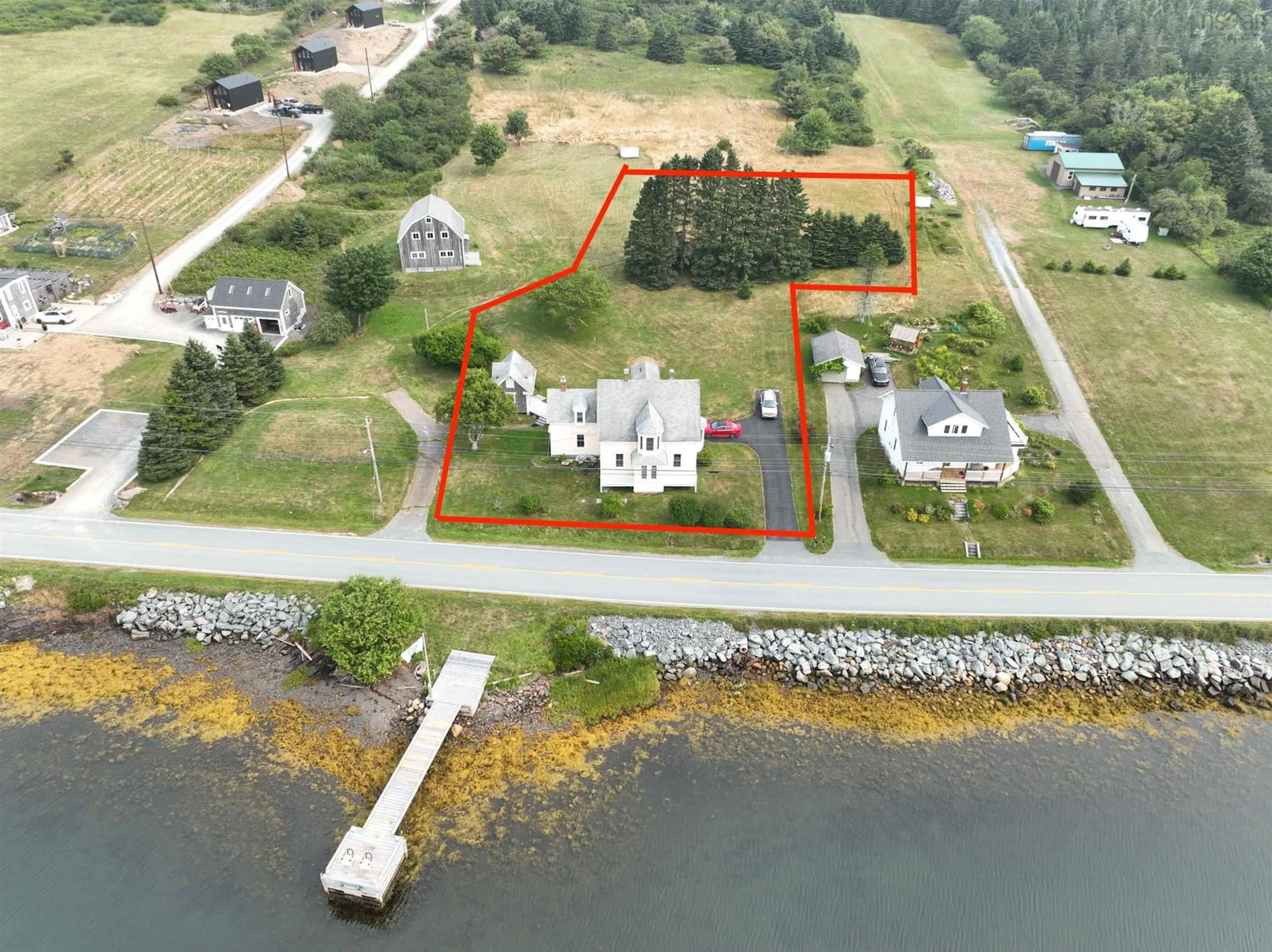 A pic from outside/outdoor area/front of a property/back of a property/a pic from drone, water/lake/river/ocean view for 3964 332 Hwy, Riverport Nova Scotia B0J 2X0