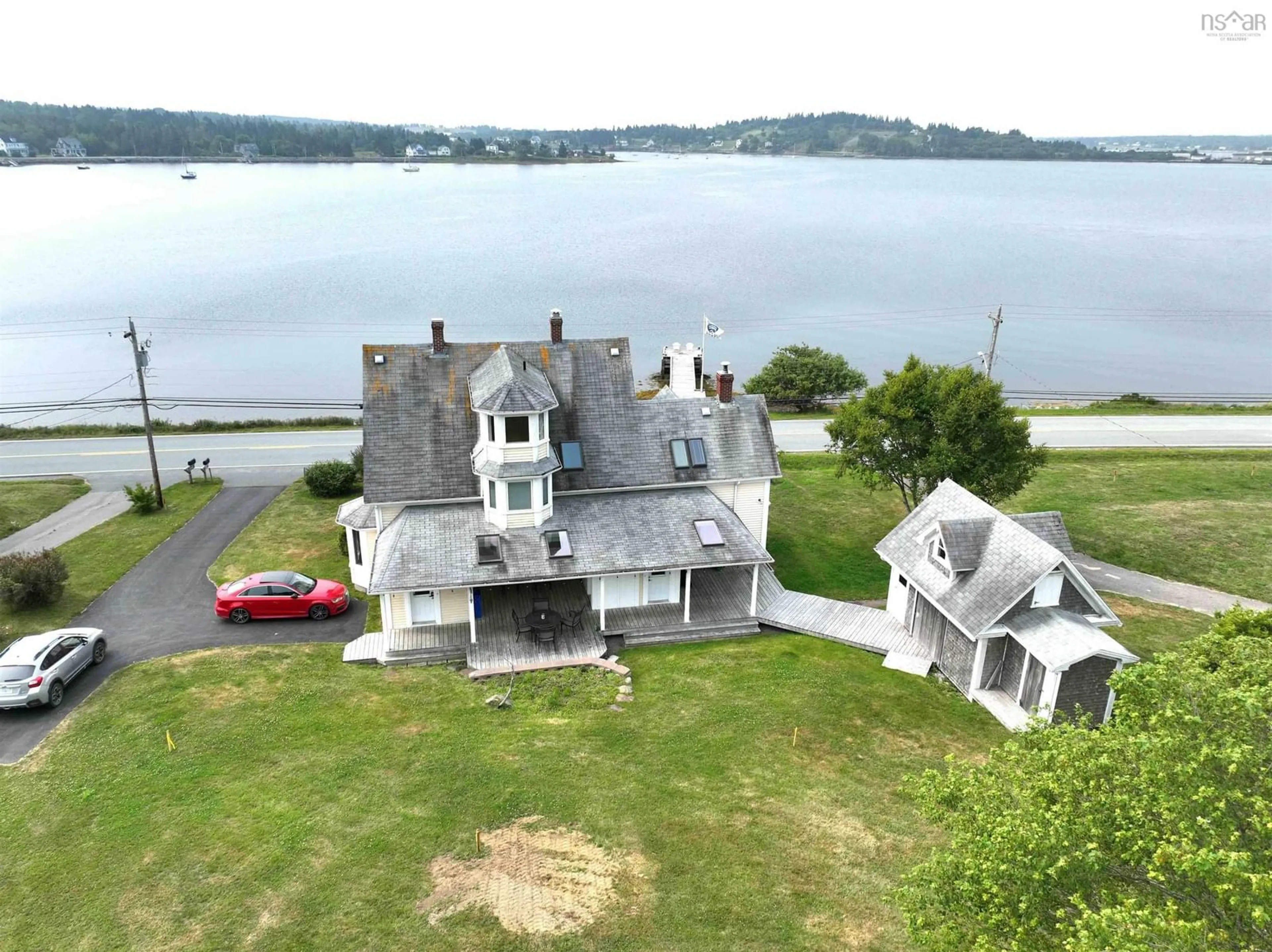 A pic from outside/outdoor area/front of a property/back of a property/a pic from drone, water/lake/river/ocean view for 3964 332 Hwy, Riverport Nova Scotia B0J 2X0