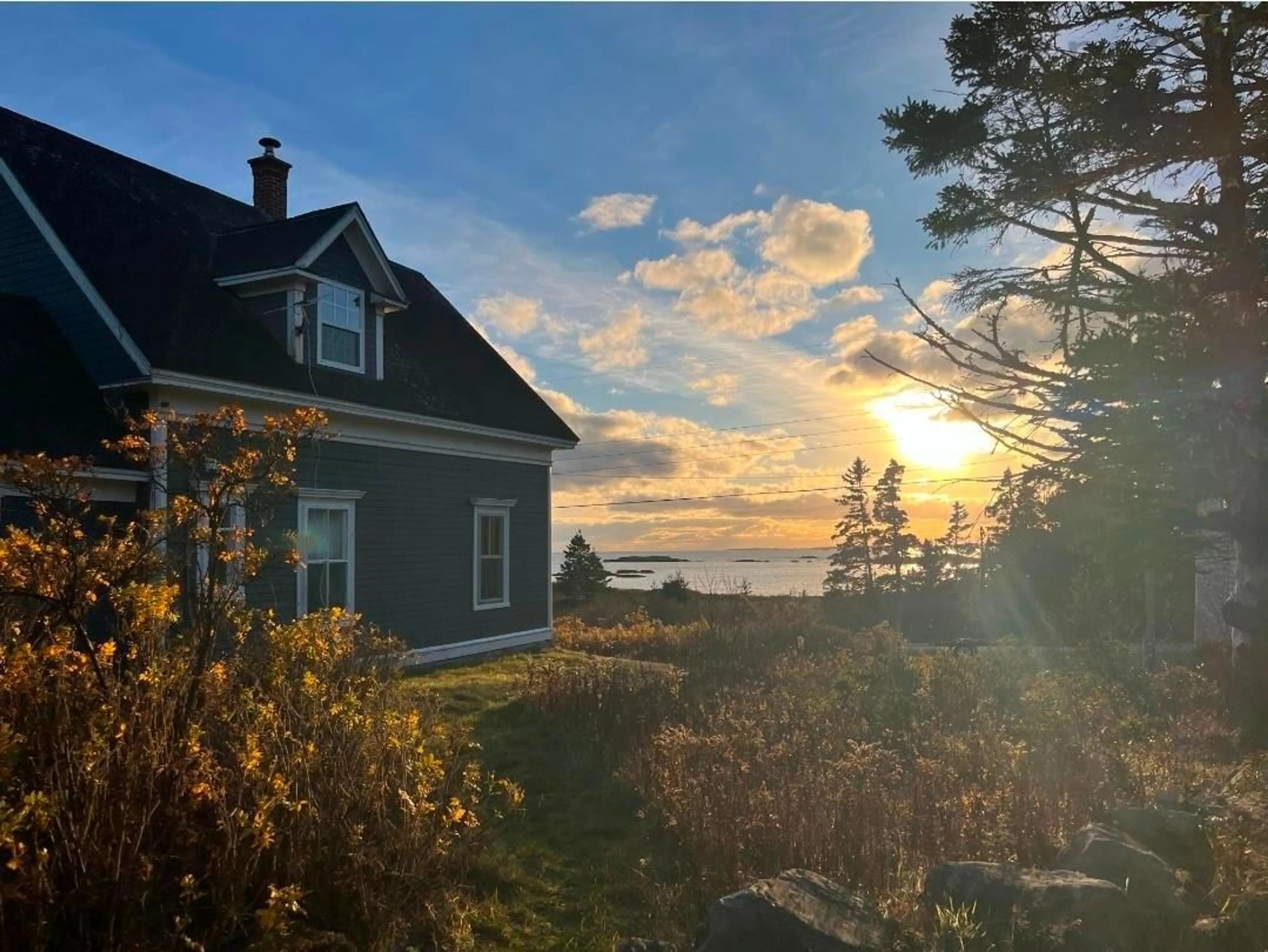 A pic from outside/outdoor area/front of a property/back of a property/a pic from drone, water/lake/river/ocean view for 257 East Side Ragged Island Rd, East Ragged Island Nova Scotia B0T 1V0