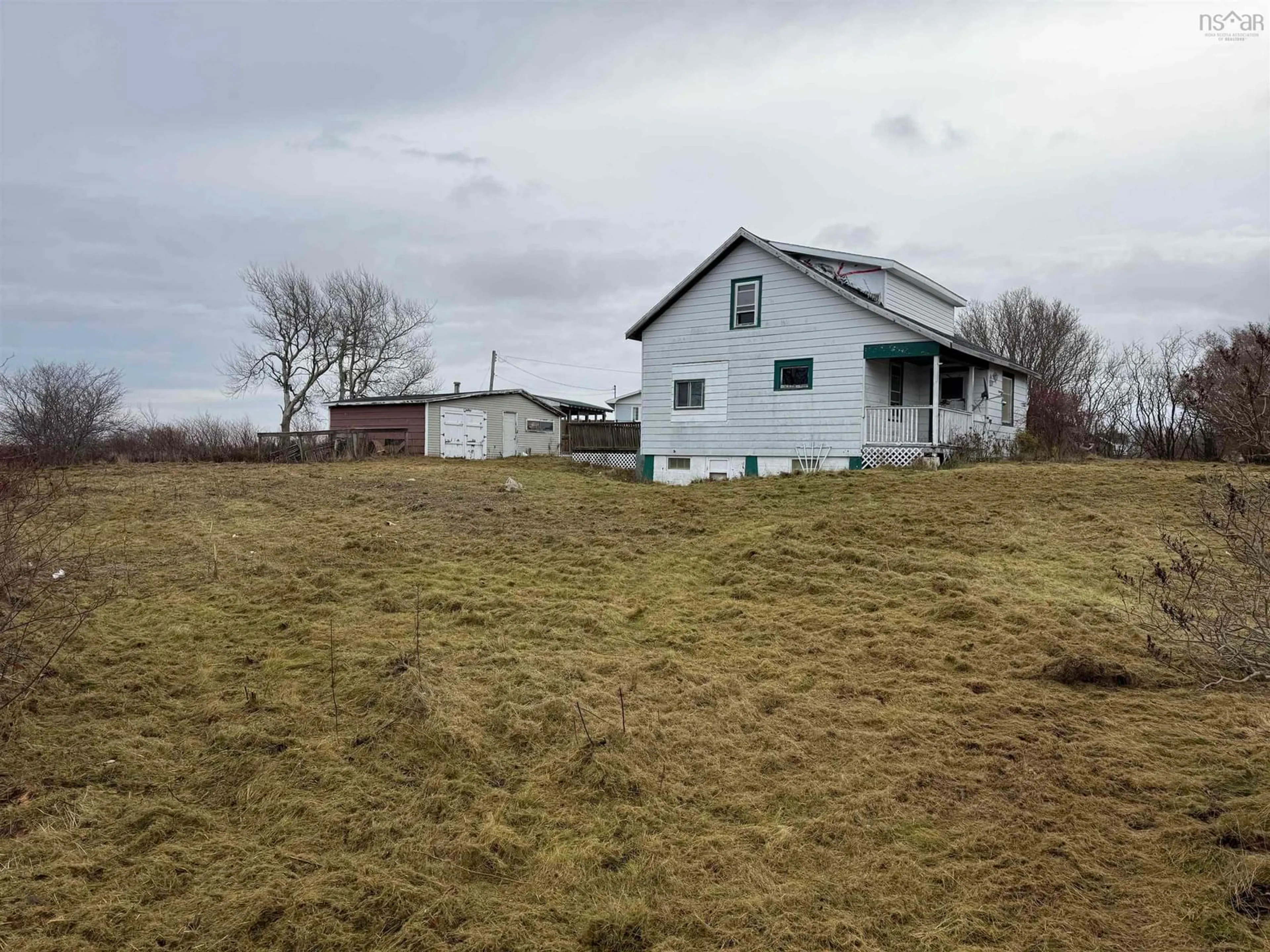 A pic from outside/outdoor area/front of a property/back of a property/a pic from drone, building for 1288 Main St, Glace Bay Nova Scotia B1A 5A4