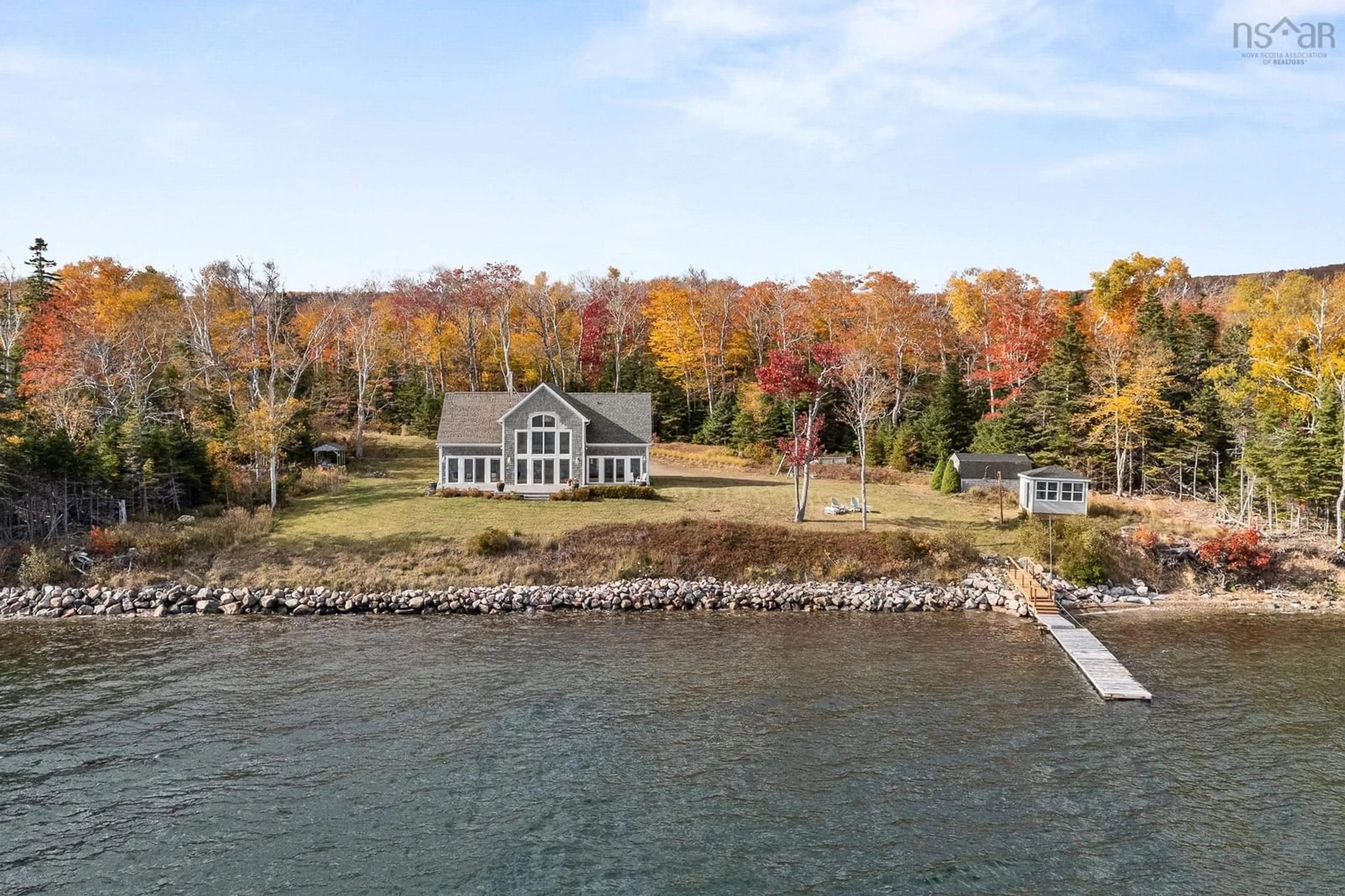 A pic from outside/outdoor area/front of a property/back of a property/a pic from drone, water/lake/river/ocean view for 1114 Mackenzie Point Rd, West Bay Marshes Nova Scotia B0E 3K0