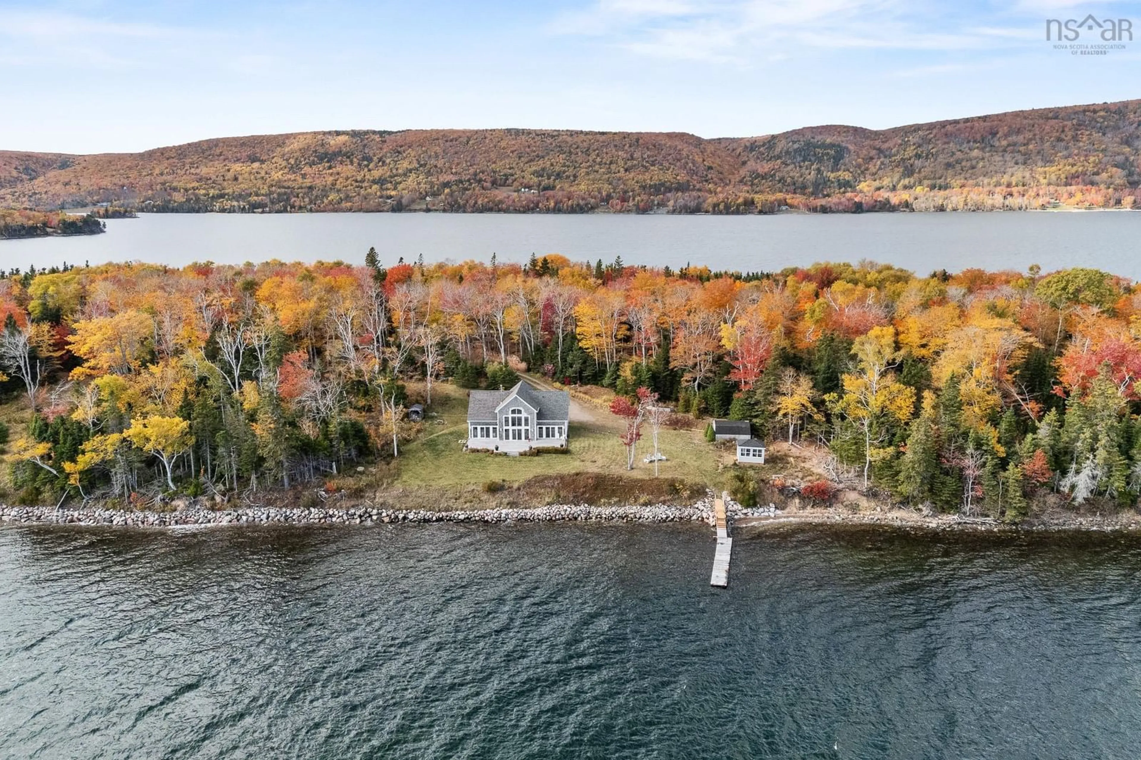 A pic from outside/outdoor area/front of a property/back of a property/a pic from drone, water/lake/river/ocean view for 1114 Mackenzie Point Rd, West Bay Marshes Nova Scotia B0E 3K0