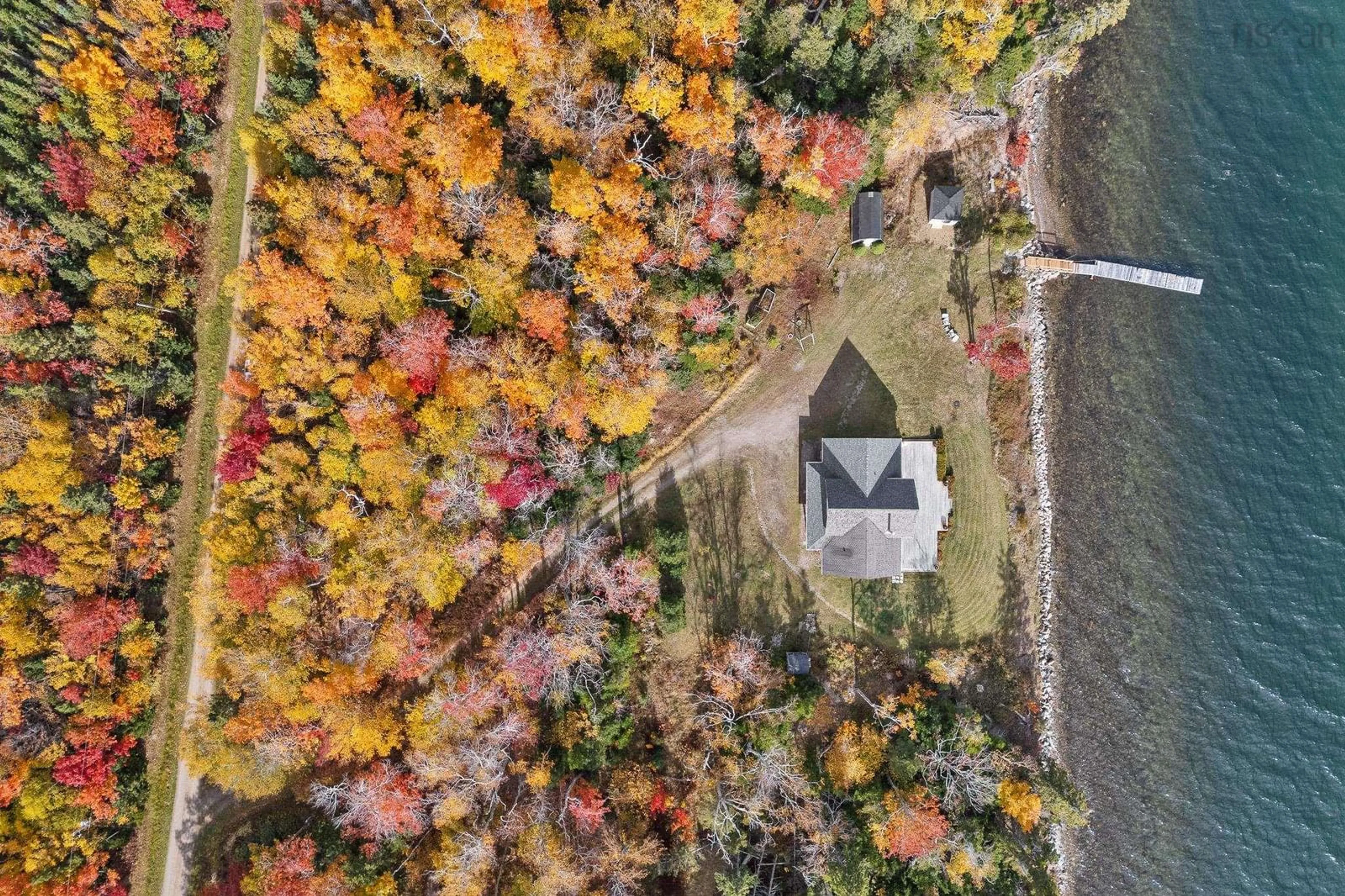 A pic from outside/outdoor area/front of a property/back of a property/a pic from drone, forest/trees view for 1114 Mackenzie Point Rd, West Bay Marshes Nova Scotia B0E 3K0