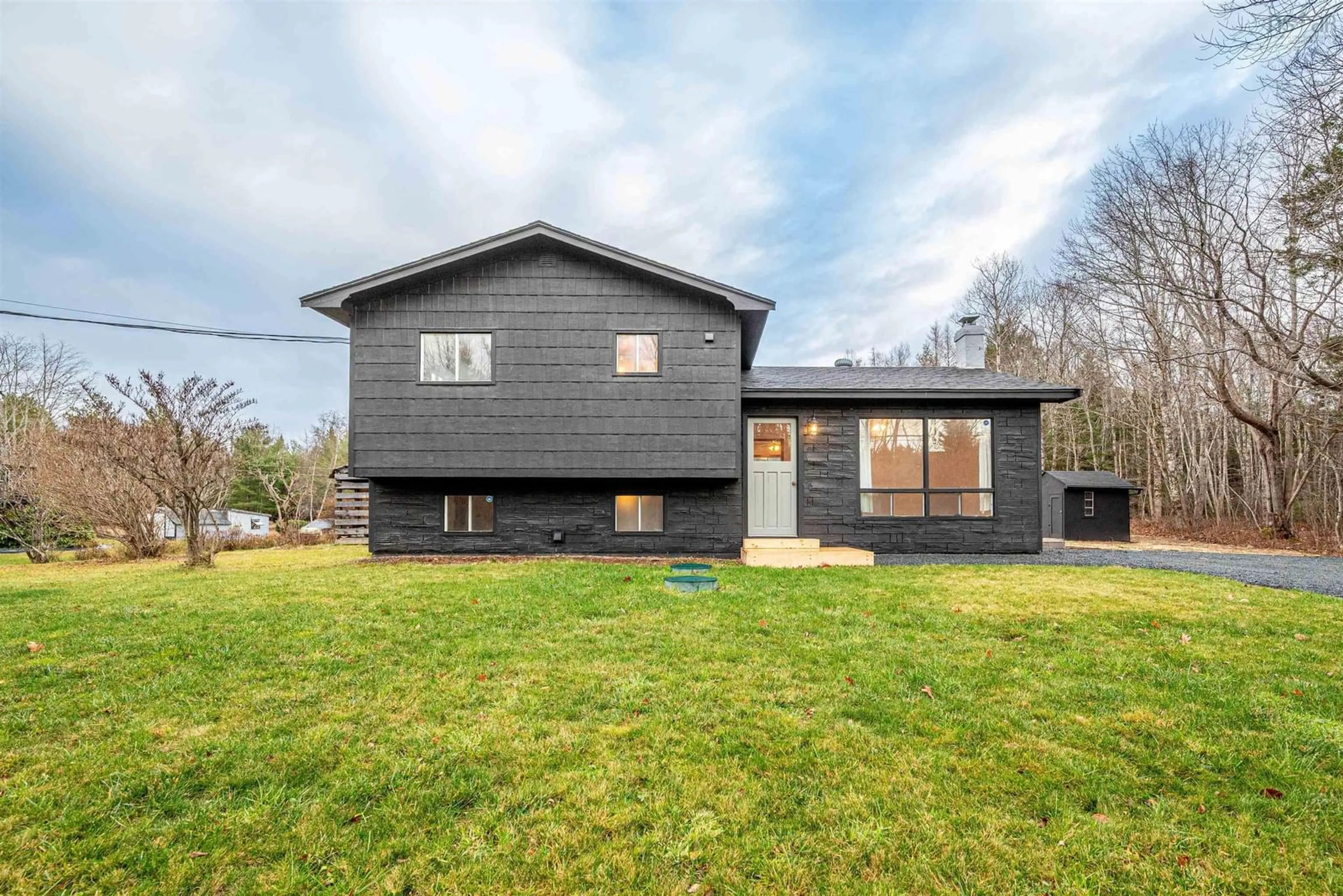 Home with vinyl exterior material, street for 34 Freeman Veinot Rd, Blockhouse Nova Scotia B0J 2E0