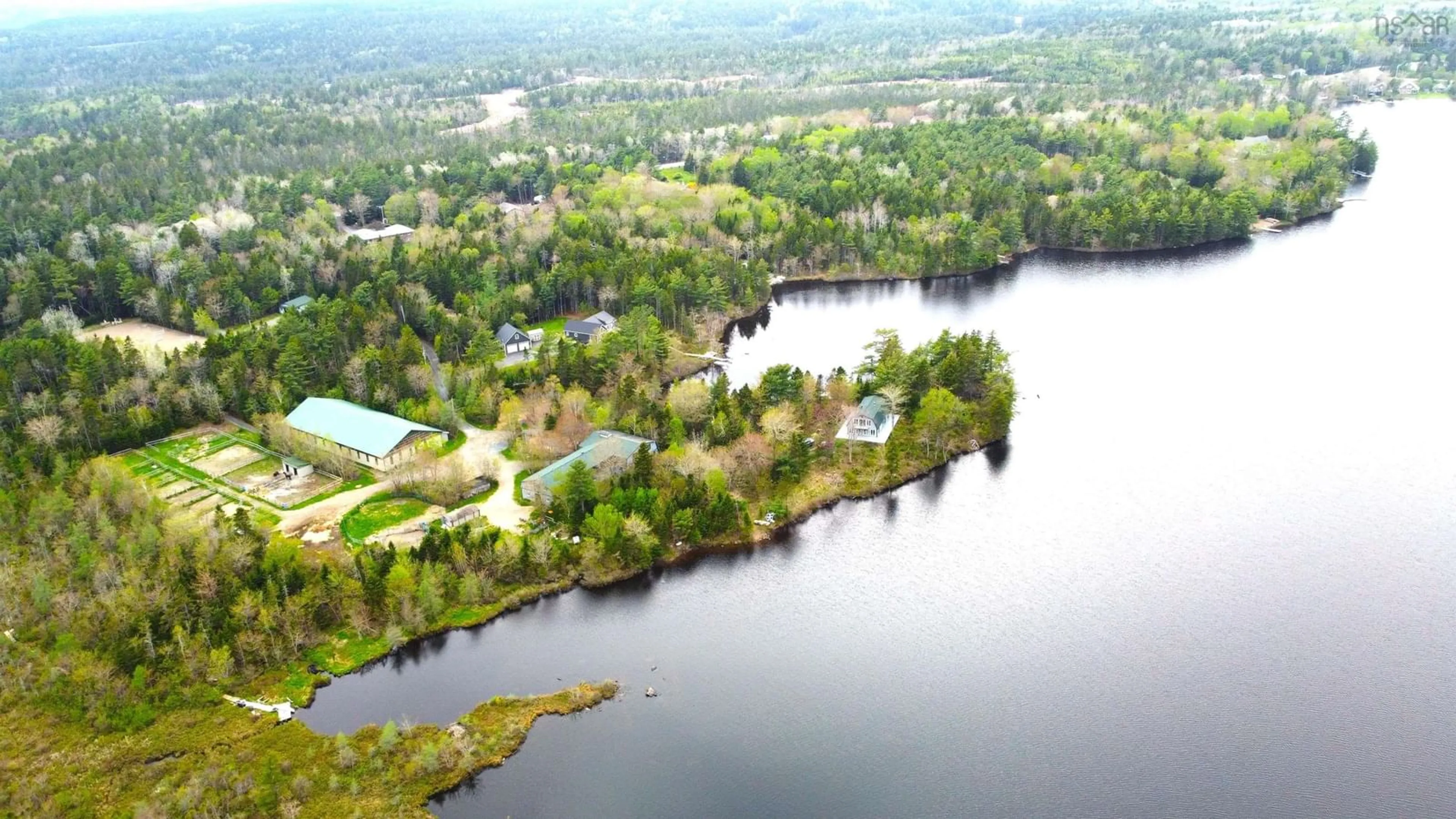 A pic from outside/outdoor area/front of a property/back of a property/a pic from drone, water/lake/river/ocean view for 401 Highway 1, Mount Uniacke Nova Scotia B0S 1B0