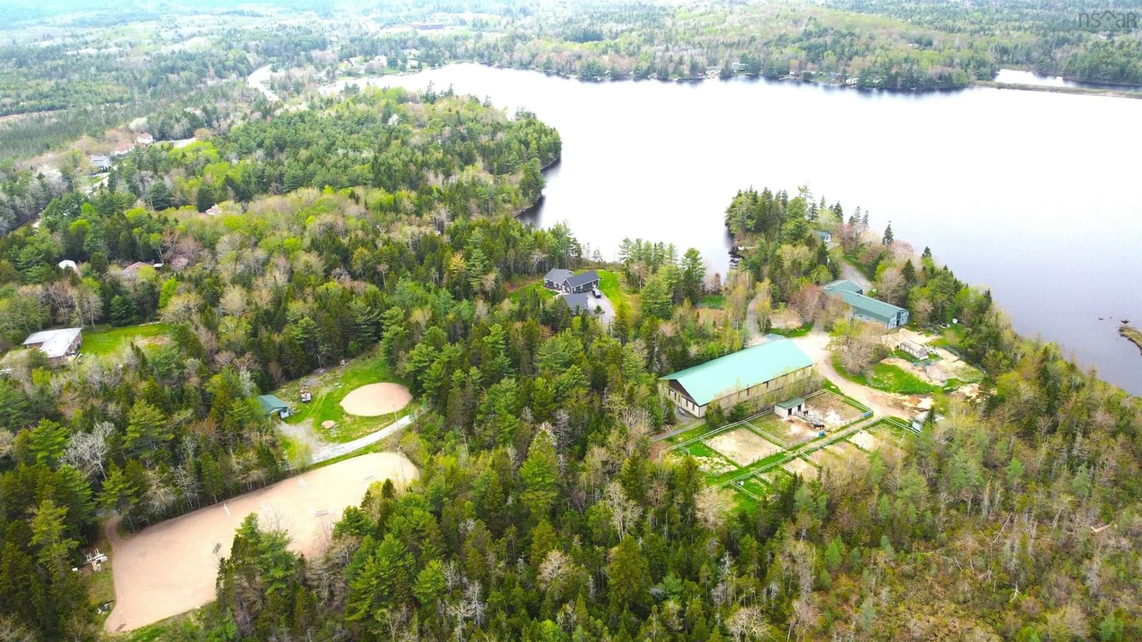 A pic from outside/outdoor area/front of a property/back of a property/a pic from drone, water/lake/river/ocean view for 401 Highway 1, Mount Uniacke Nova Scotia B0S 1B0