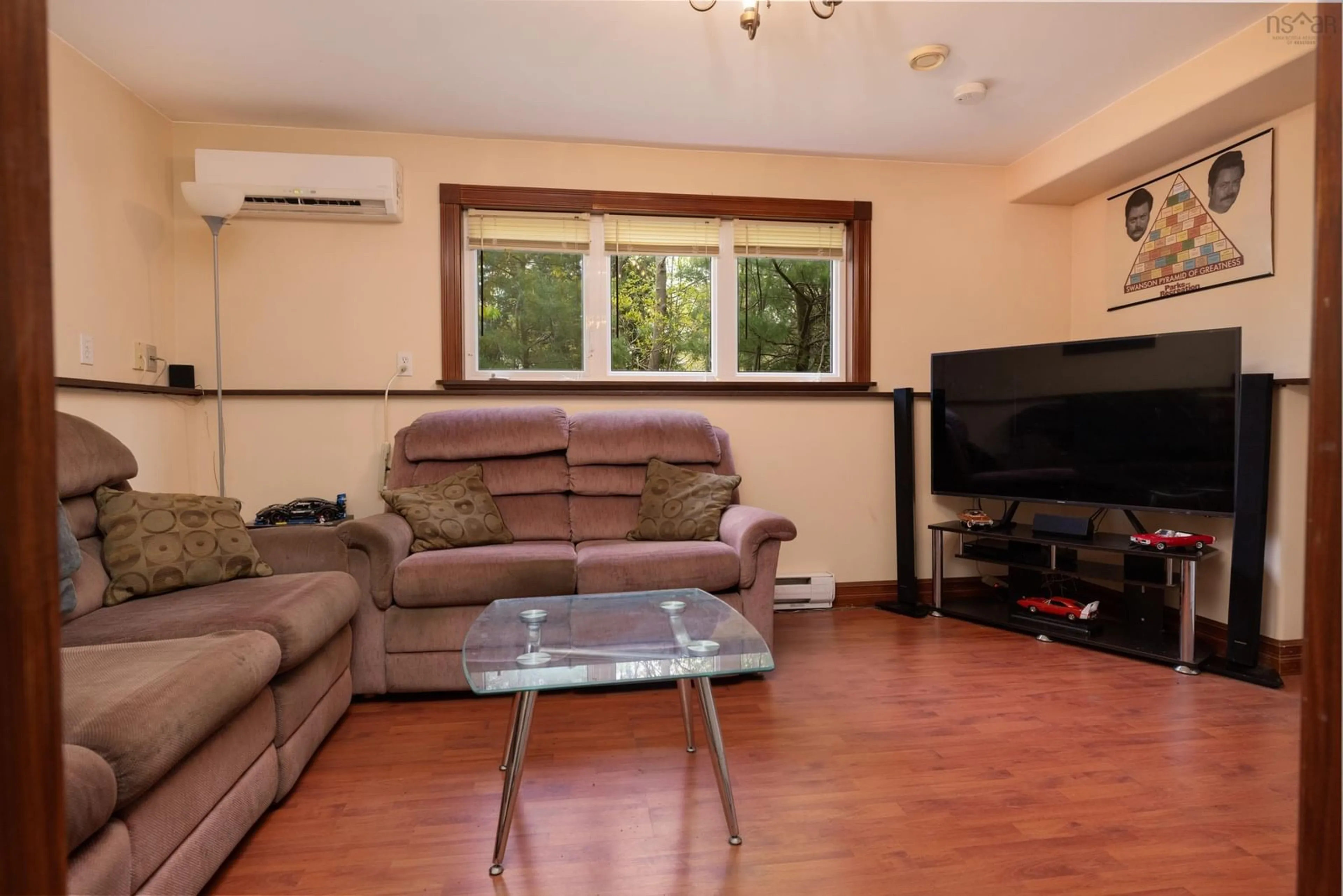 Living room with furniture, wood/laminate floor for 11 Millview Ave, Bedford Nova Scotia B4A 1G8