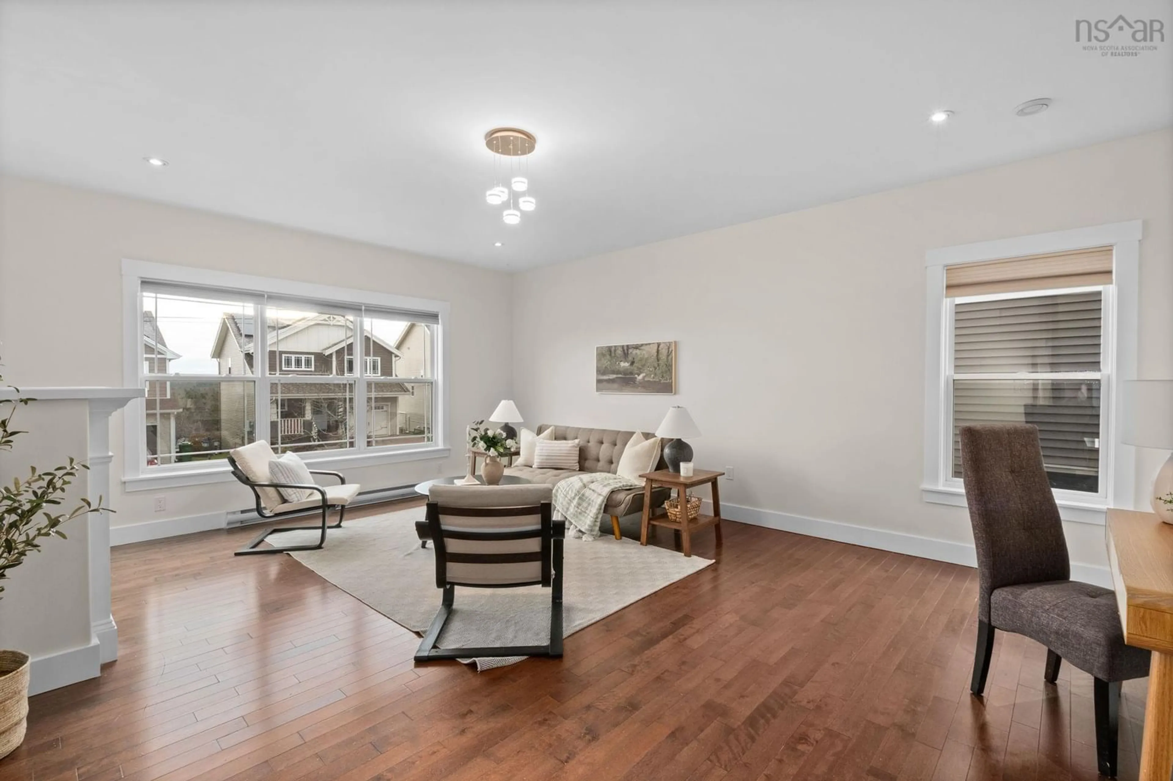 Living room with furniture, wood/laminate floor for 38 Sienna Crt, Timberlea Nova Scotia B3T 0E3