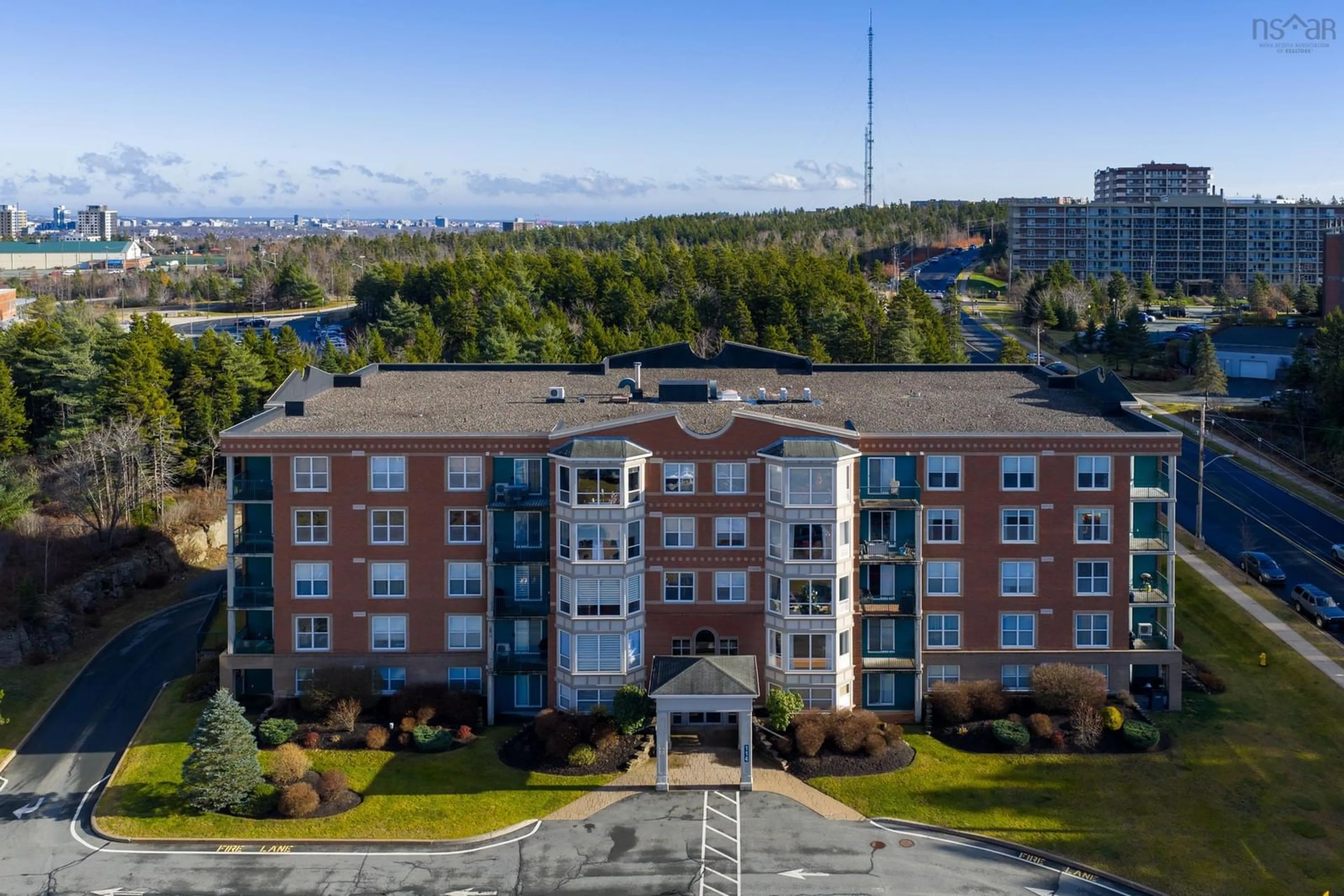 A pic from outside/outdoor area/front of a property/back of a property/a pic from drone, unknown for 114 Regency Park Dr #404, Halifax Nova Scotia B3S 1R9
