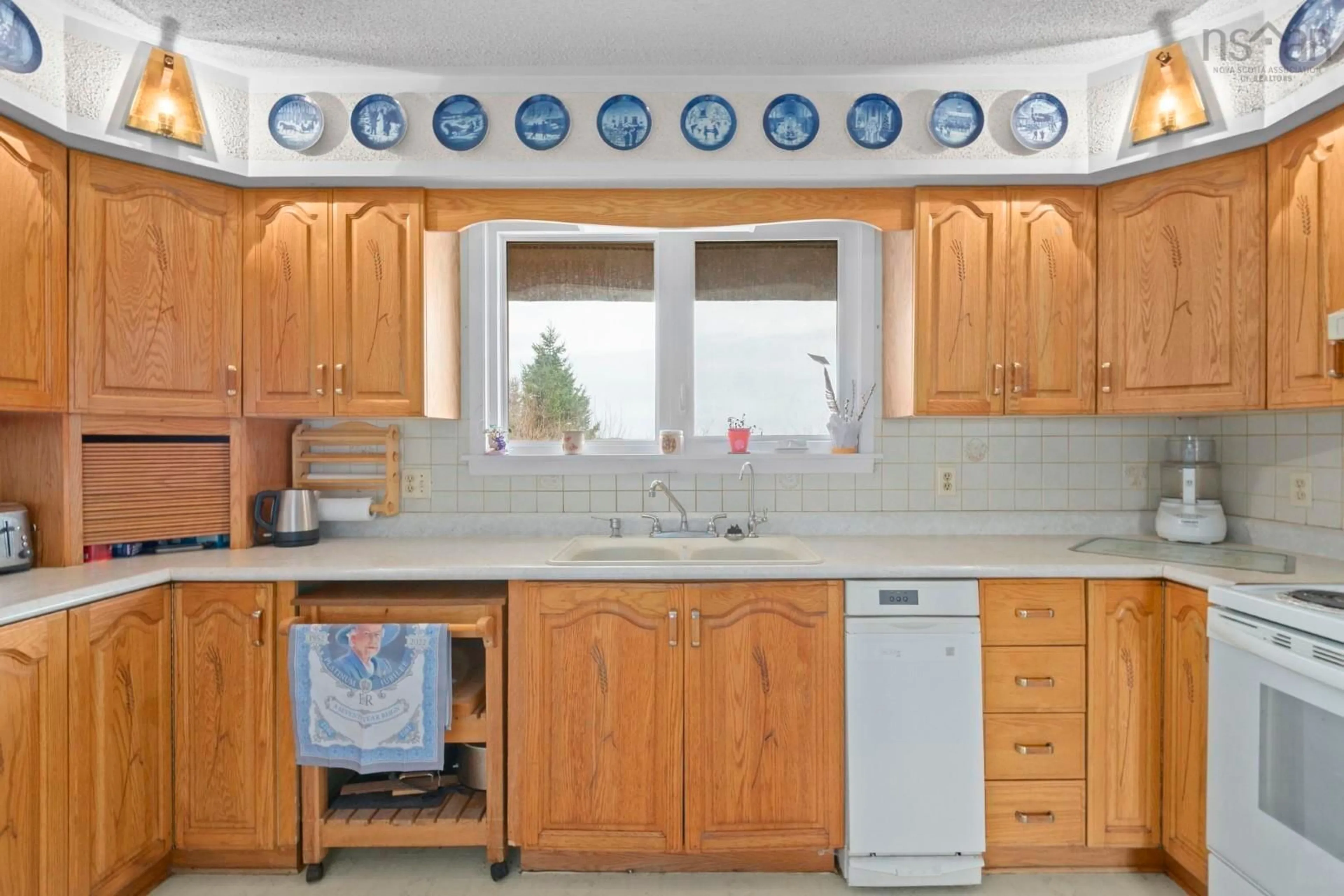 Standard kitchen, ceramic/tile floor for 45 Littles Rd, Terence Bay Nova Scotia B3T 1Y7