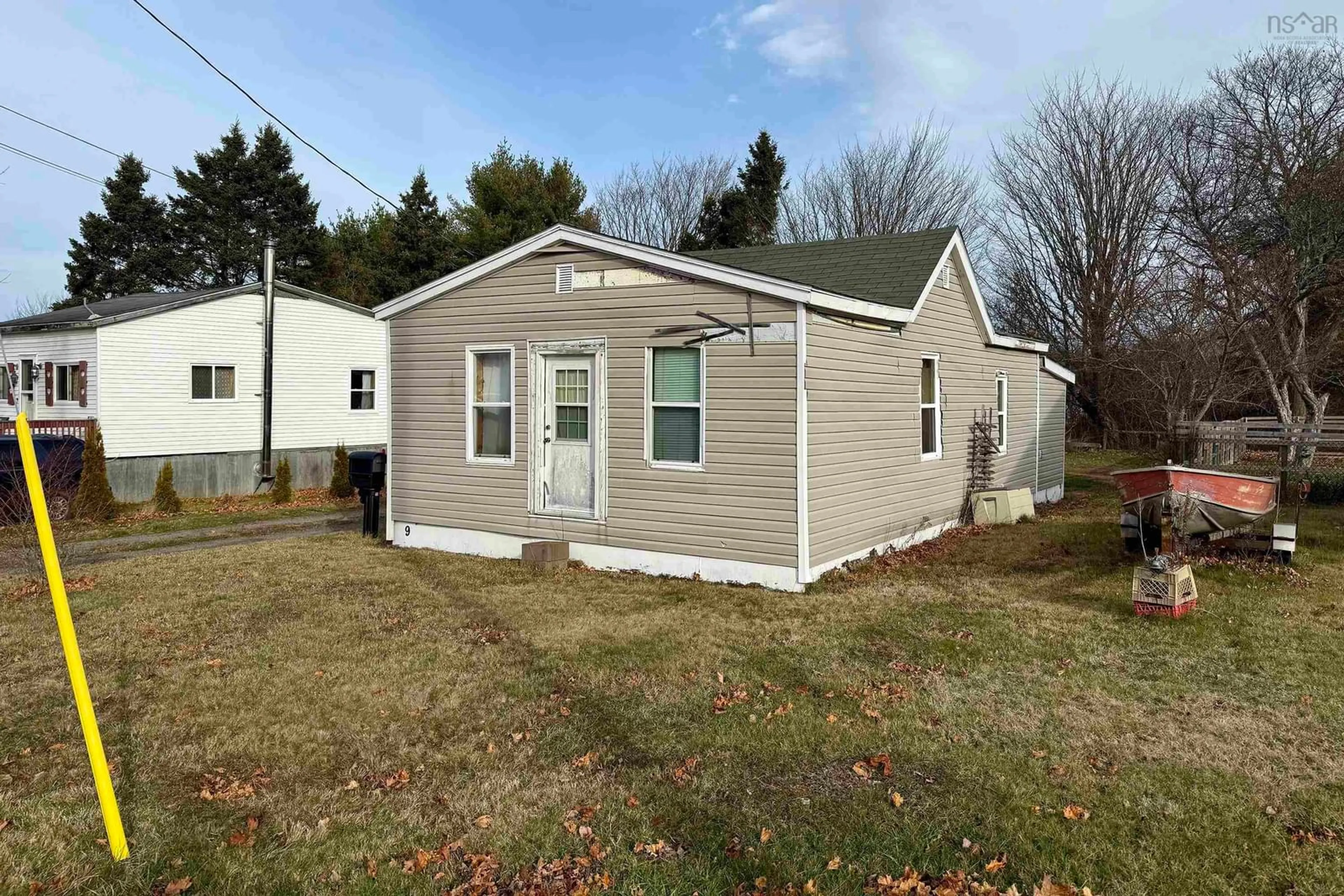 Home with vinyl exterior material, street for 9 Victor Ave, Amherst Nova Scotia B4H 2L3