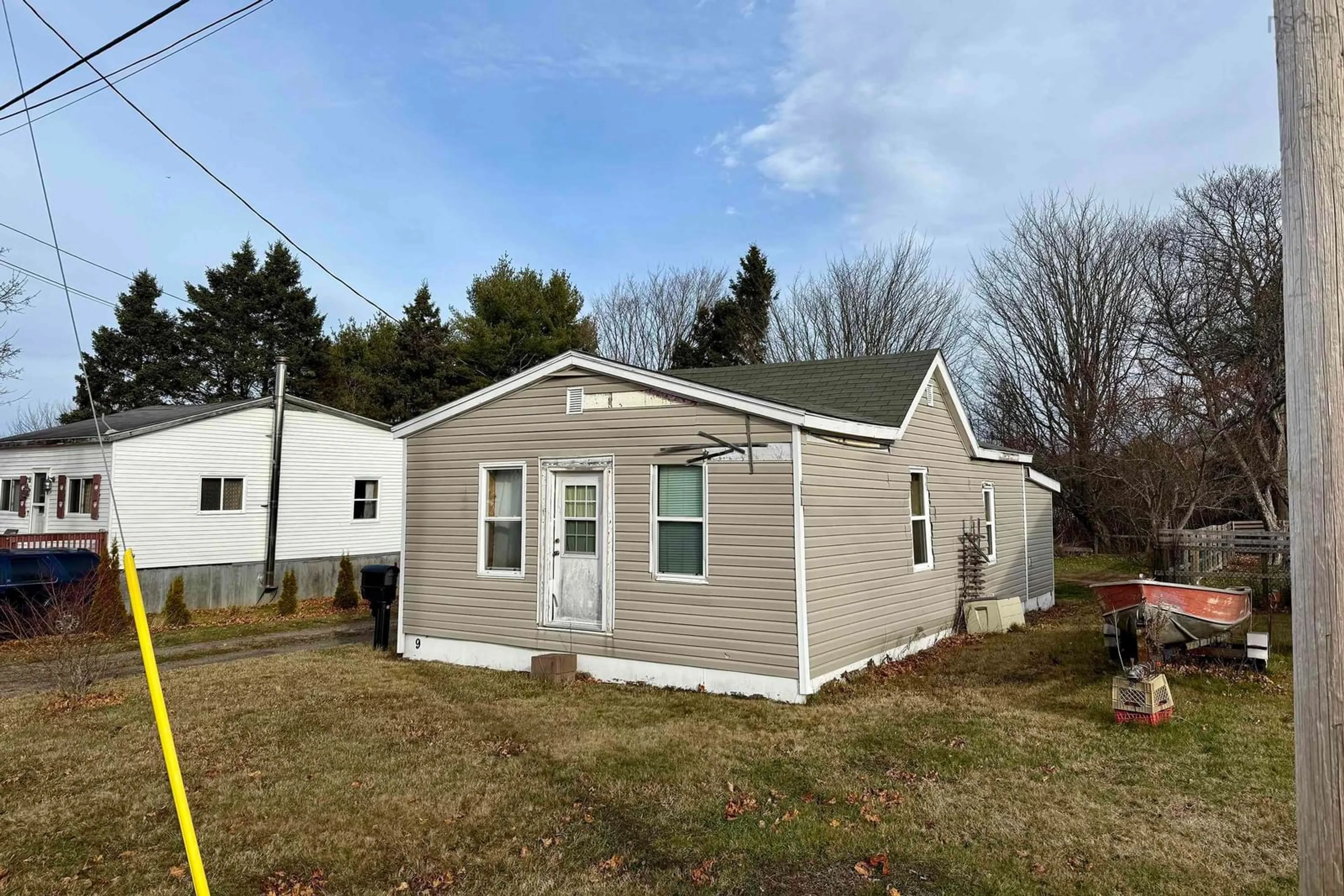 Home with vinyl exterior material, street for 9 Victor Ave, Amherst Nova Scotia B4H 2L3