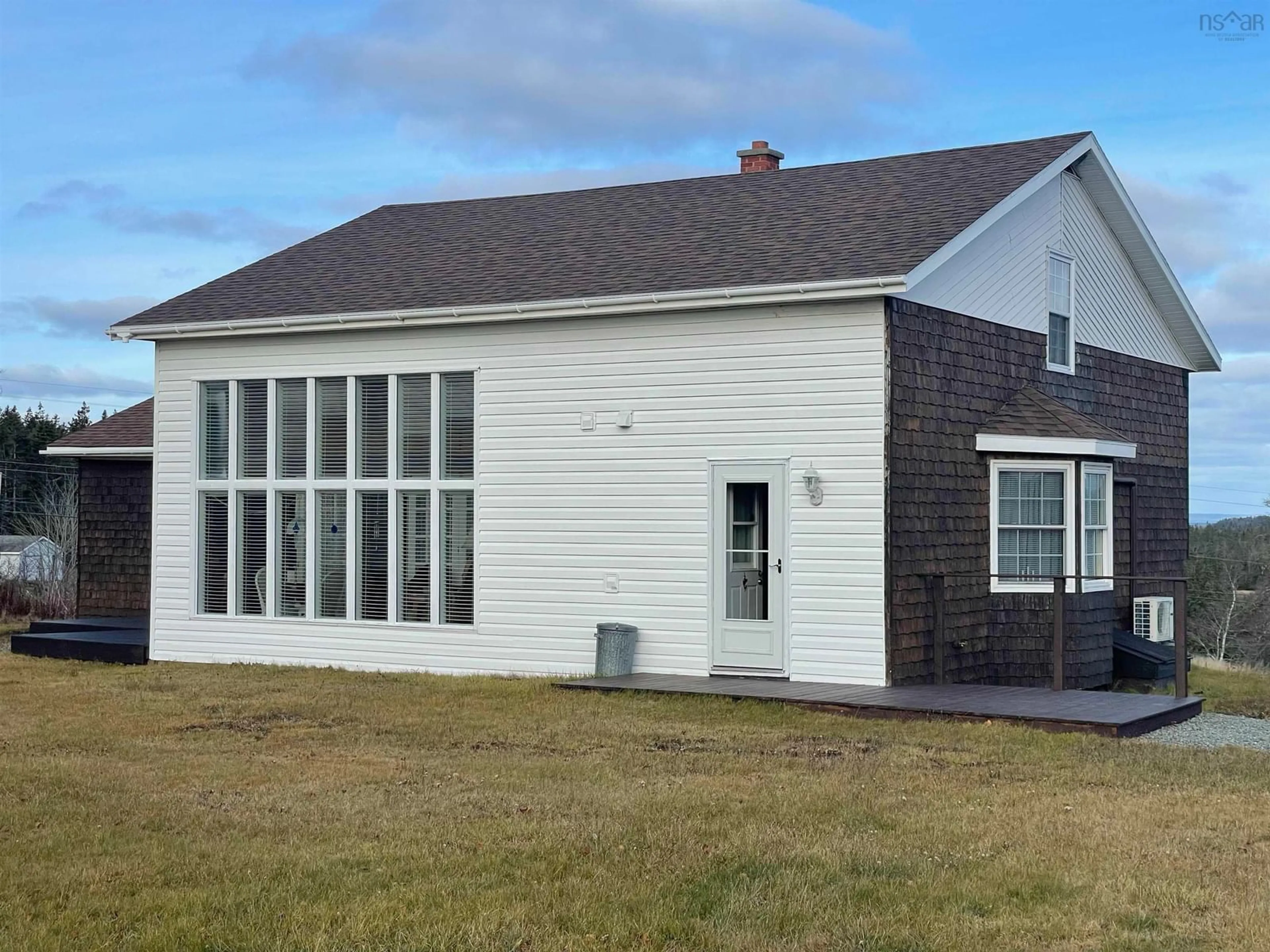Home with vinyl exterior material, building for 11690 Highway 4, Barra Head Nova Scotia B0E 3B0