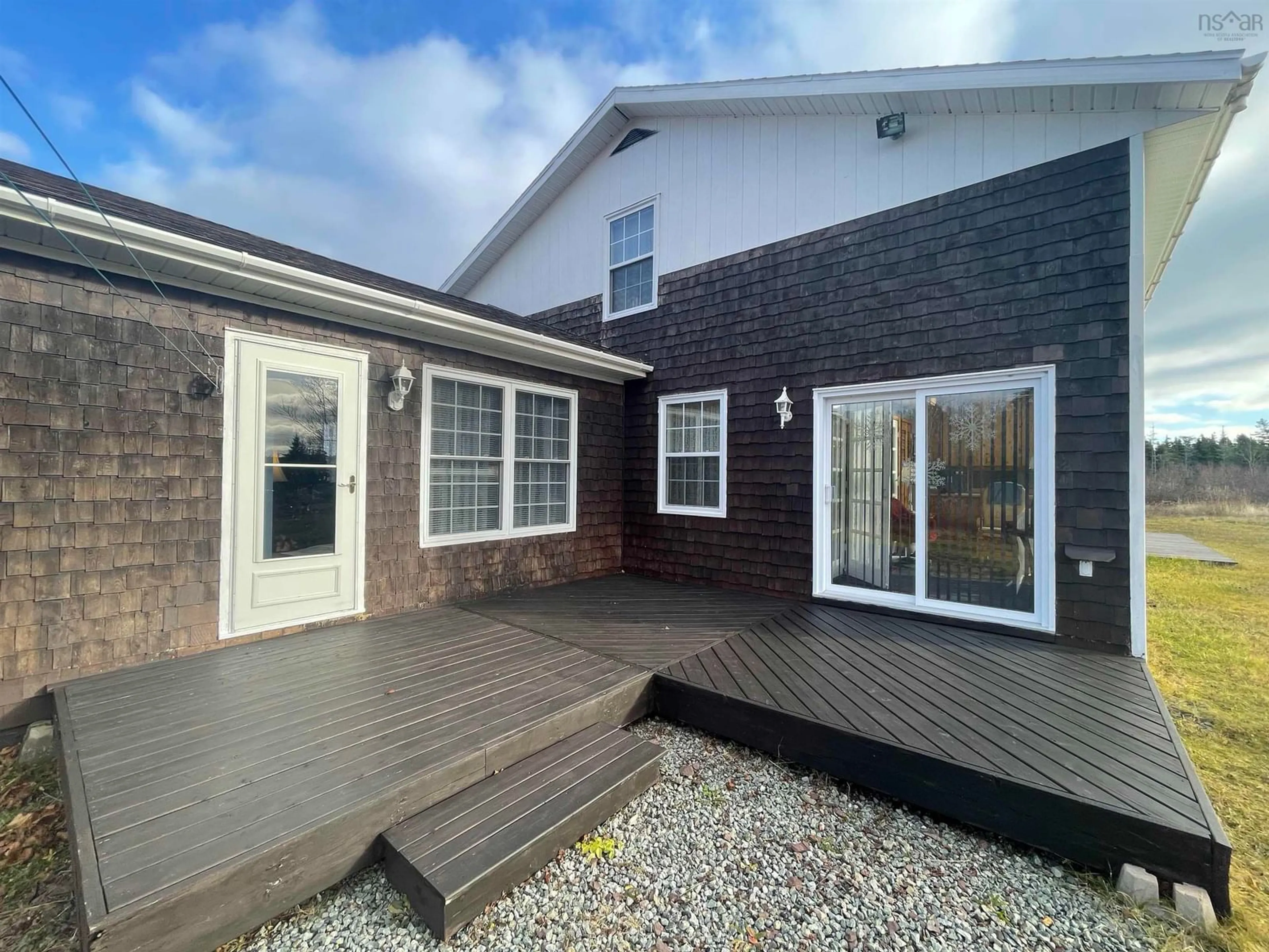 Home with vinyl exterior material, unknown for 11690 Highway 4, Barra Head Nova Scotia B0E 3B0
