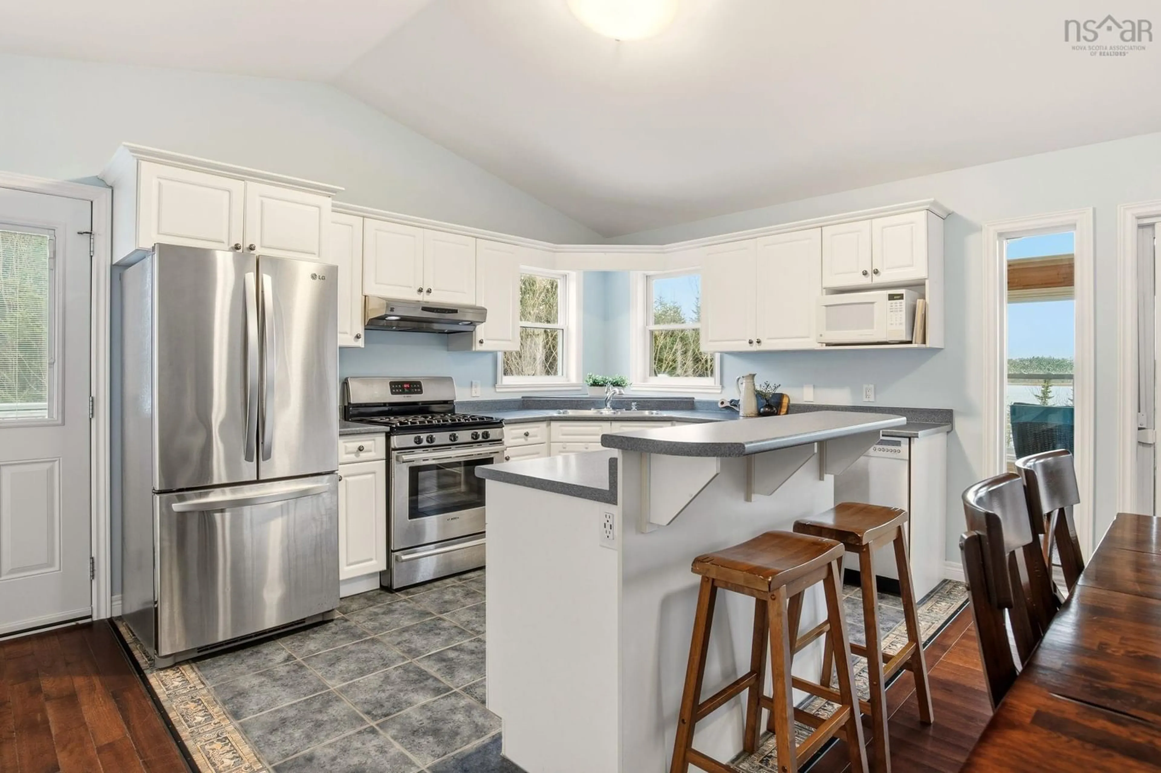 Open concept kitchen, ceramic/tile floor for 38 Bastian Point Rd, East Lawrencetown Nova Scotia B2Z 1P8