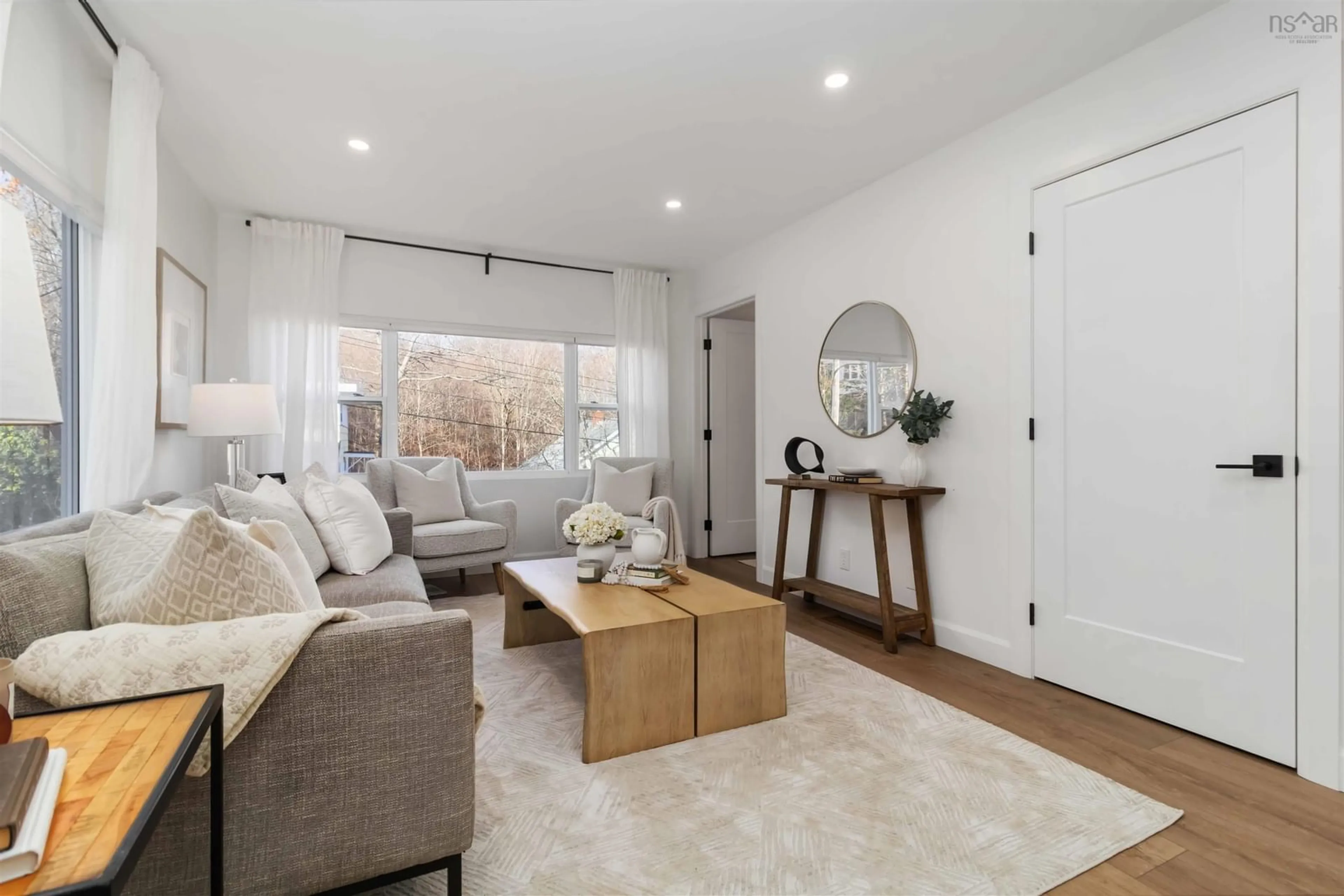 Living room with furniture, wood/laminate floor for 23 Oakdale Cres, Dartmouth Nova Scotia B3A 2L7