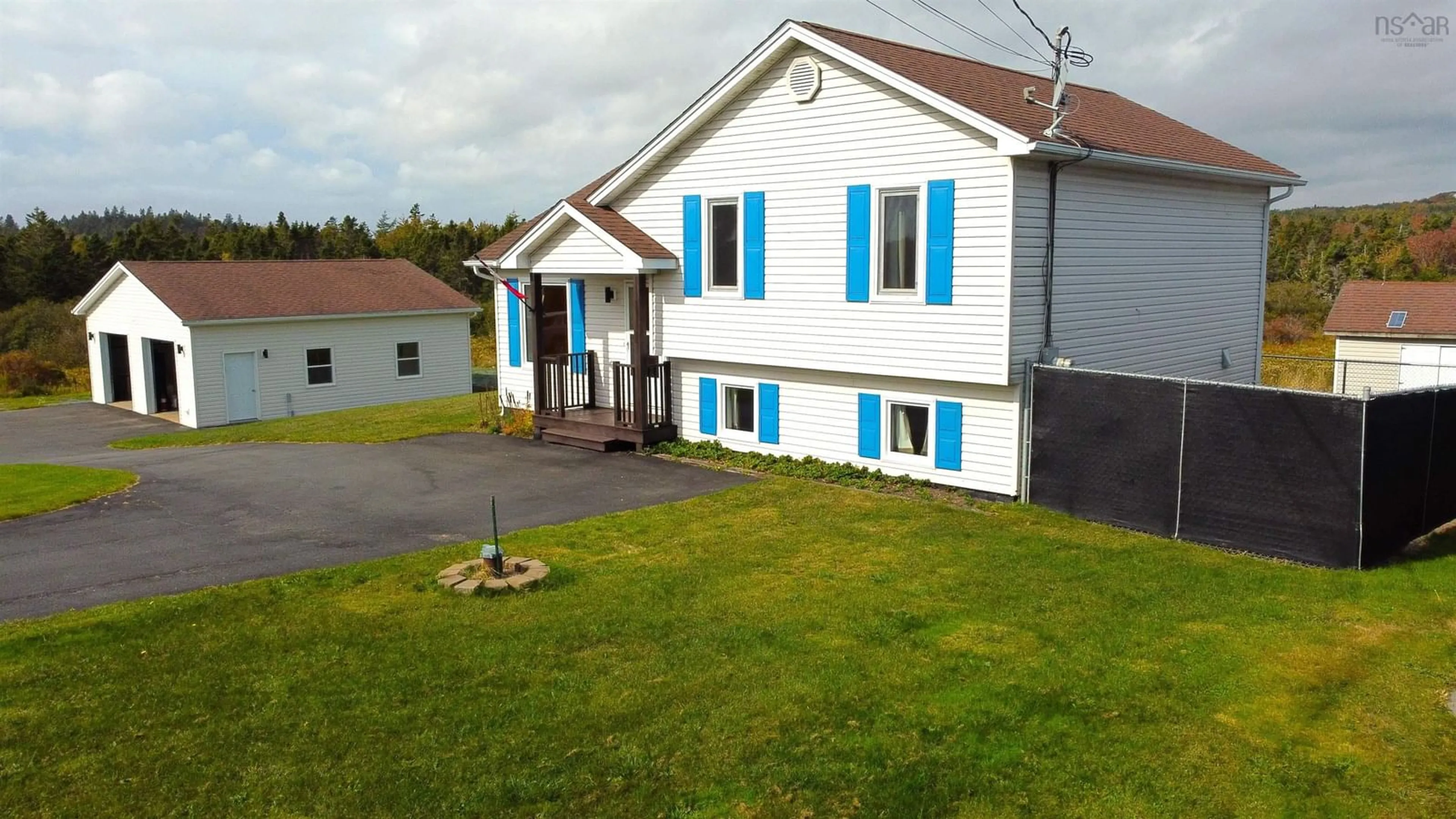A pic from outside/outdoor area/front of a property/back of a property/a pic from drone, building for 1534 Cow Bay Rd, Cow Bay Nova Scotia B3G 1L3