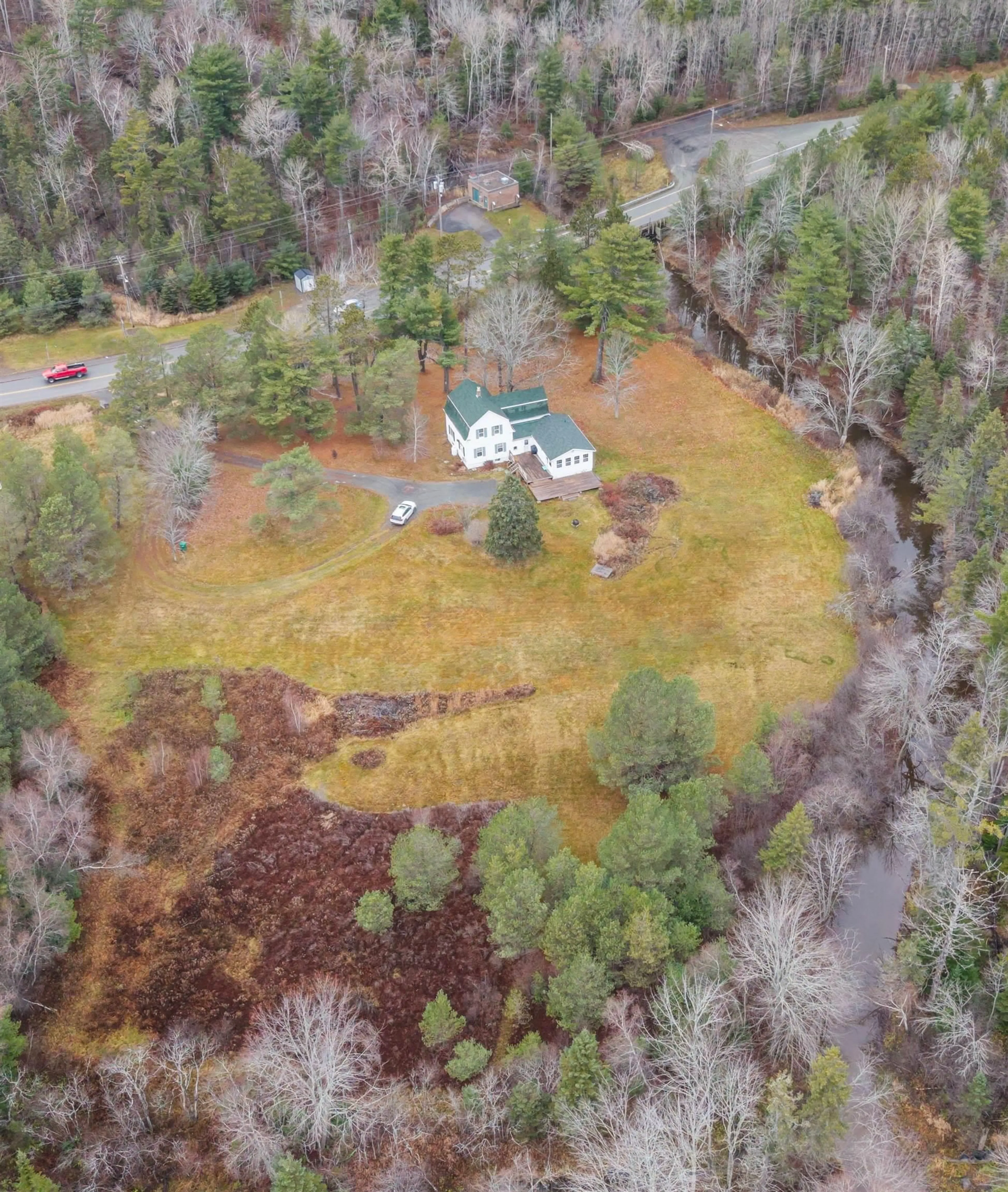 A pic from outside/outdoor area/front of a property/back of a property/a pic from drone, forest/trees view for 1273 North Main St, Westville Nova Scotia B0K 2A0