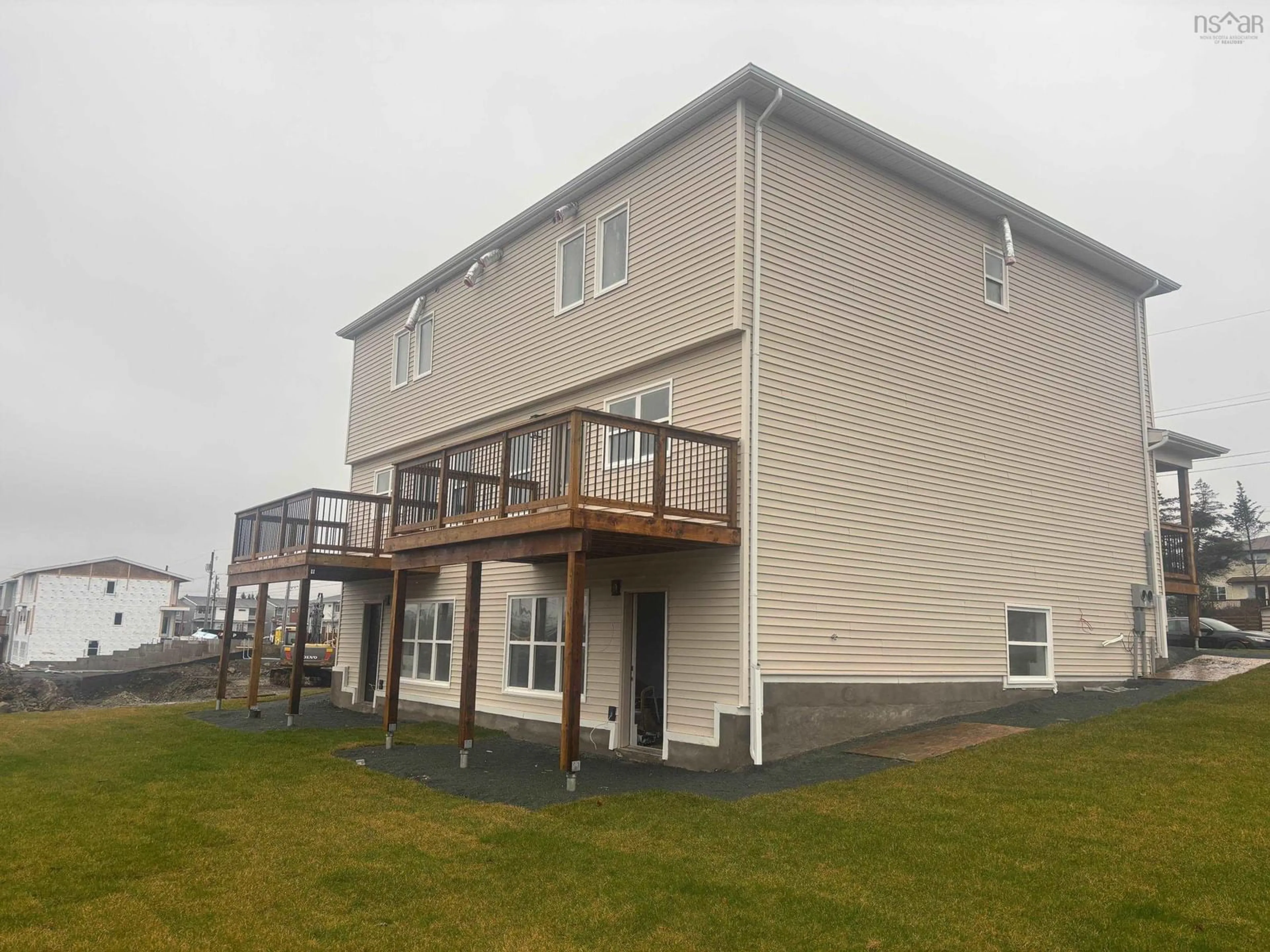 A pic from outside/outdoor area/front of a property/back of a property/a pic from drone, building for 6 Berm St, Spryfield Nova Scotia B3R 0H2