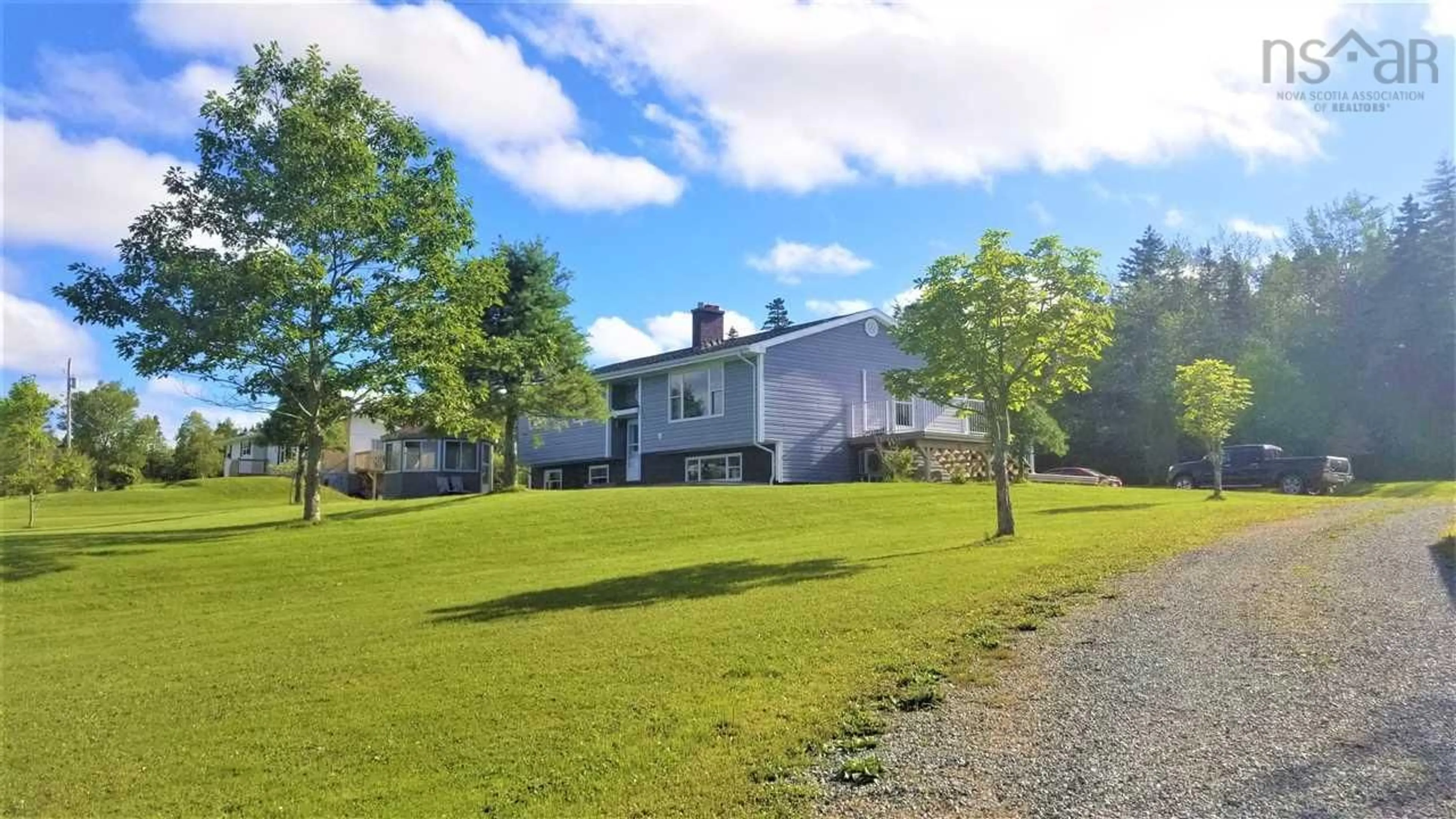 A pic from outside/outdoor area/front of a property/back of a property/a pic from drone, unknown for 110 De Raymond St, St. Peter's Nova Scotia B0E 3B0