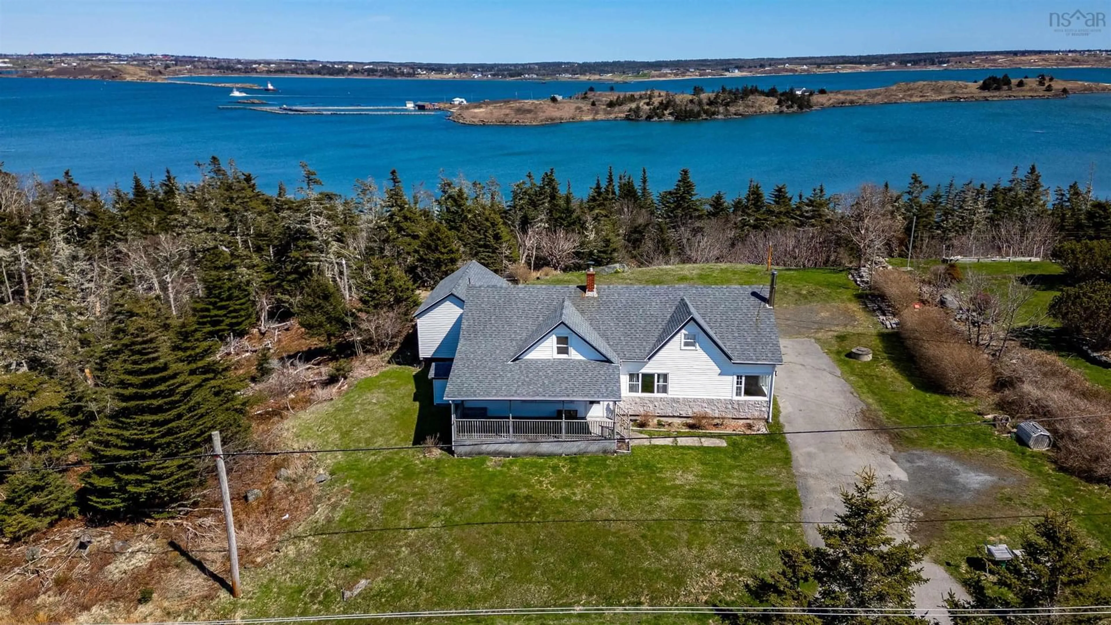 A pic from outside/outdoor area/front of a property/back of a property/a pic from drone, water/lake/river/ocean view for 1415 Highway 304, Cape Forchu Nova Scotia B5A 5G7
