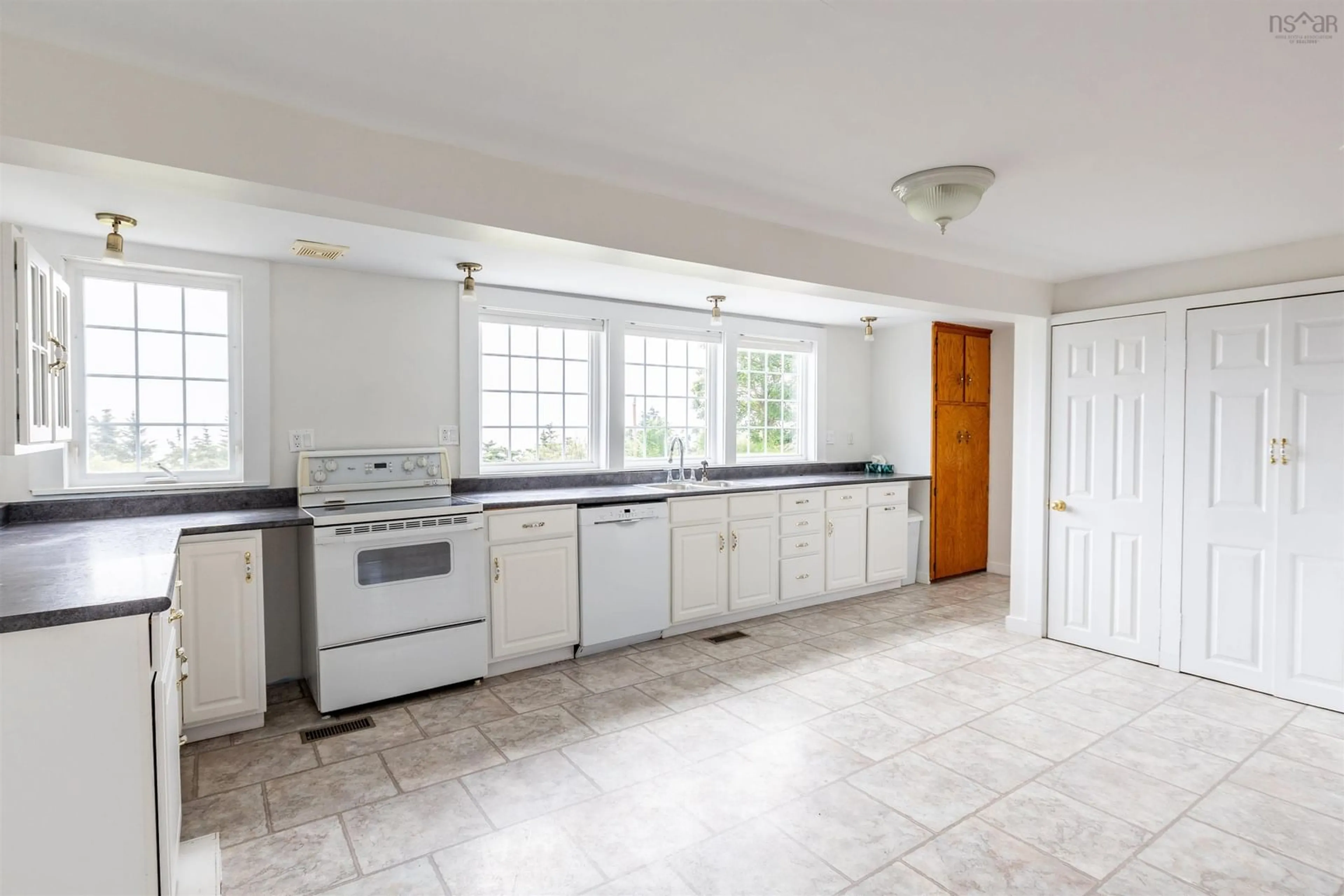 Standard kitchen, ceramic/tile floor for 1415 Highway 304, Cape Forchu Nova Scotia B5A 5G7
