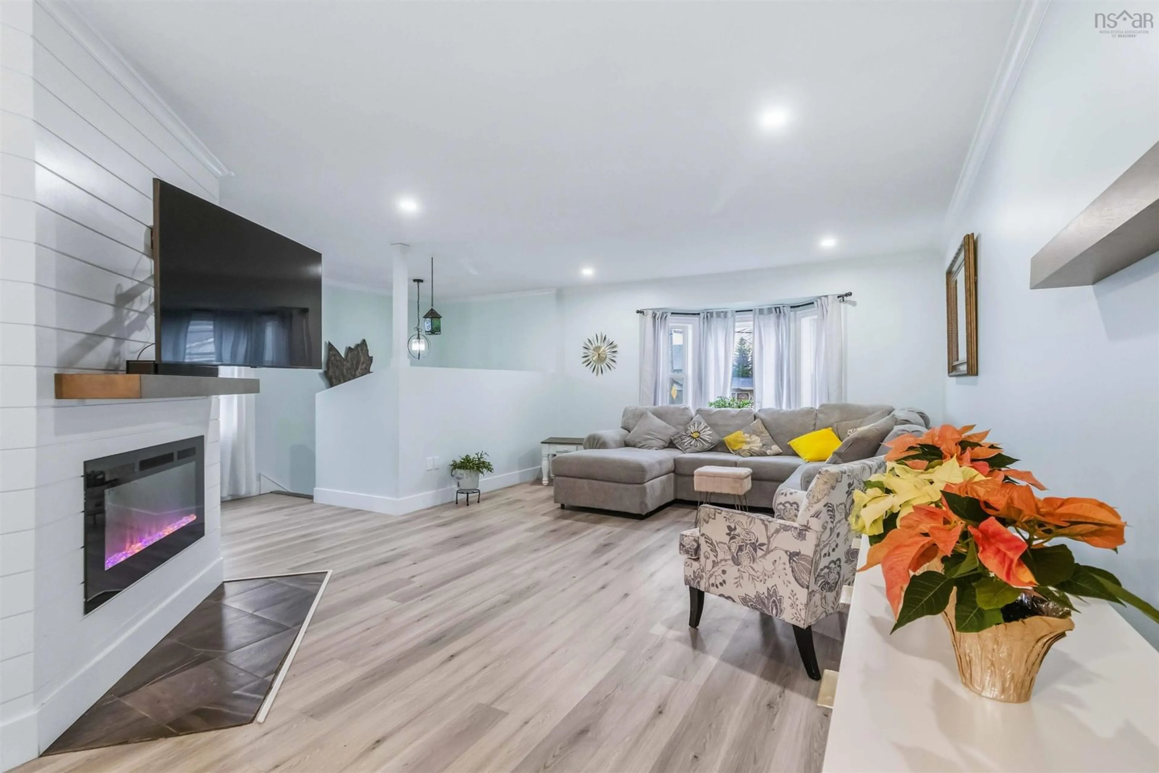 Living room with furniture, wood/laminate floor for 10 Thorncrest Crt, Eastern Passage Nova Scotia B3G 1N4