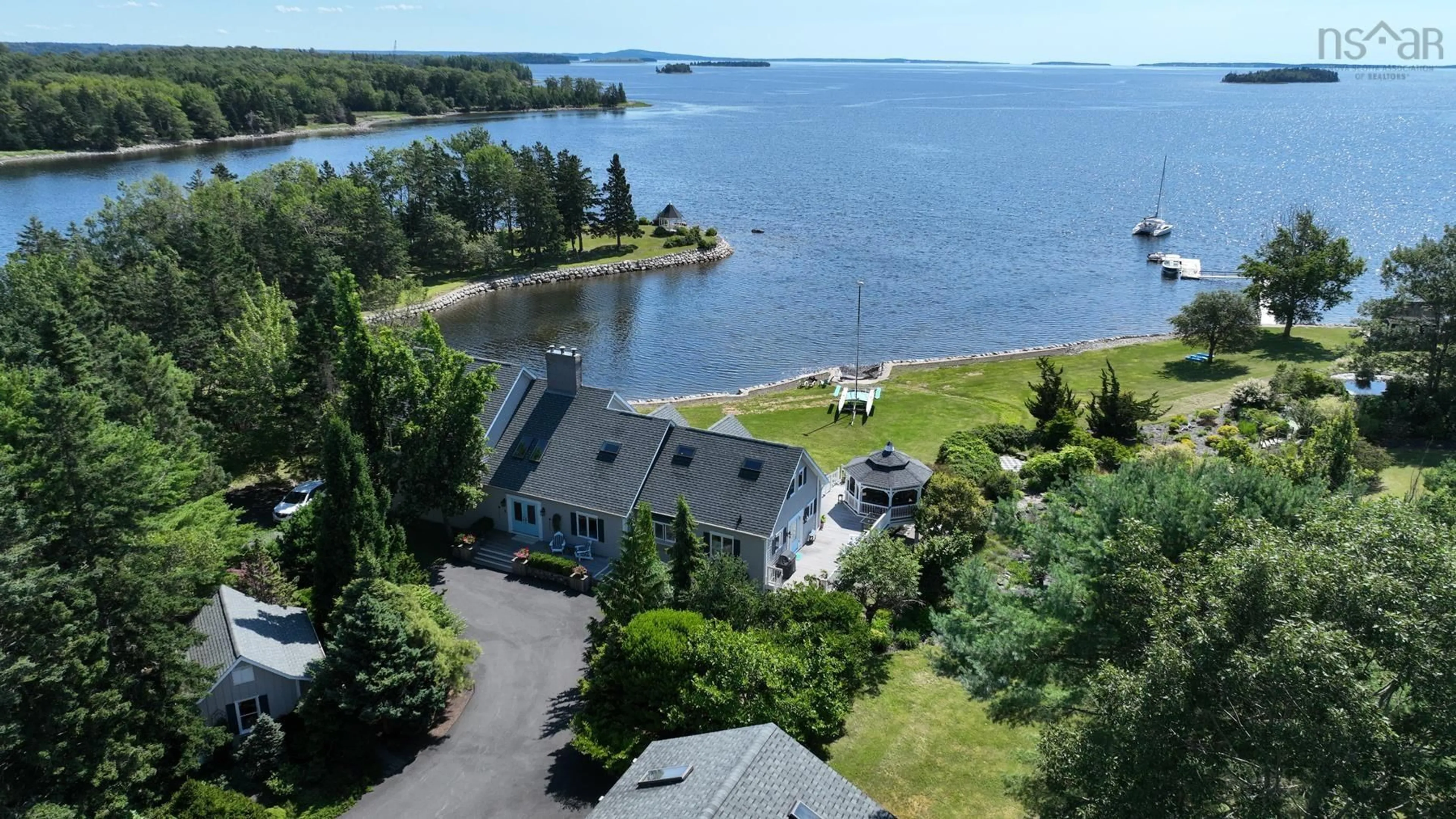 A pic from outside/outdoor area/front of a property/back of a property/a pic from drone, water/lake/river/ocean view for 226 Crandall Rd, Martins Point Nova Scotia B0J 2E0