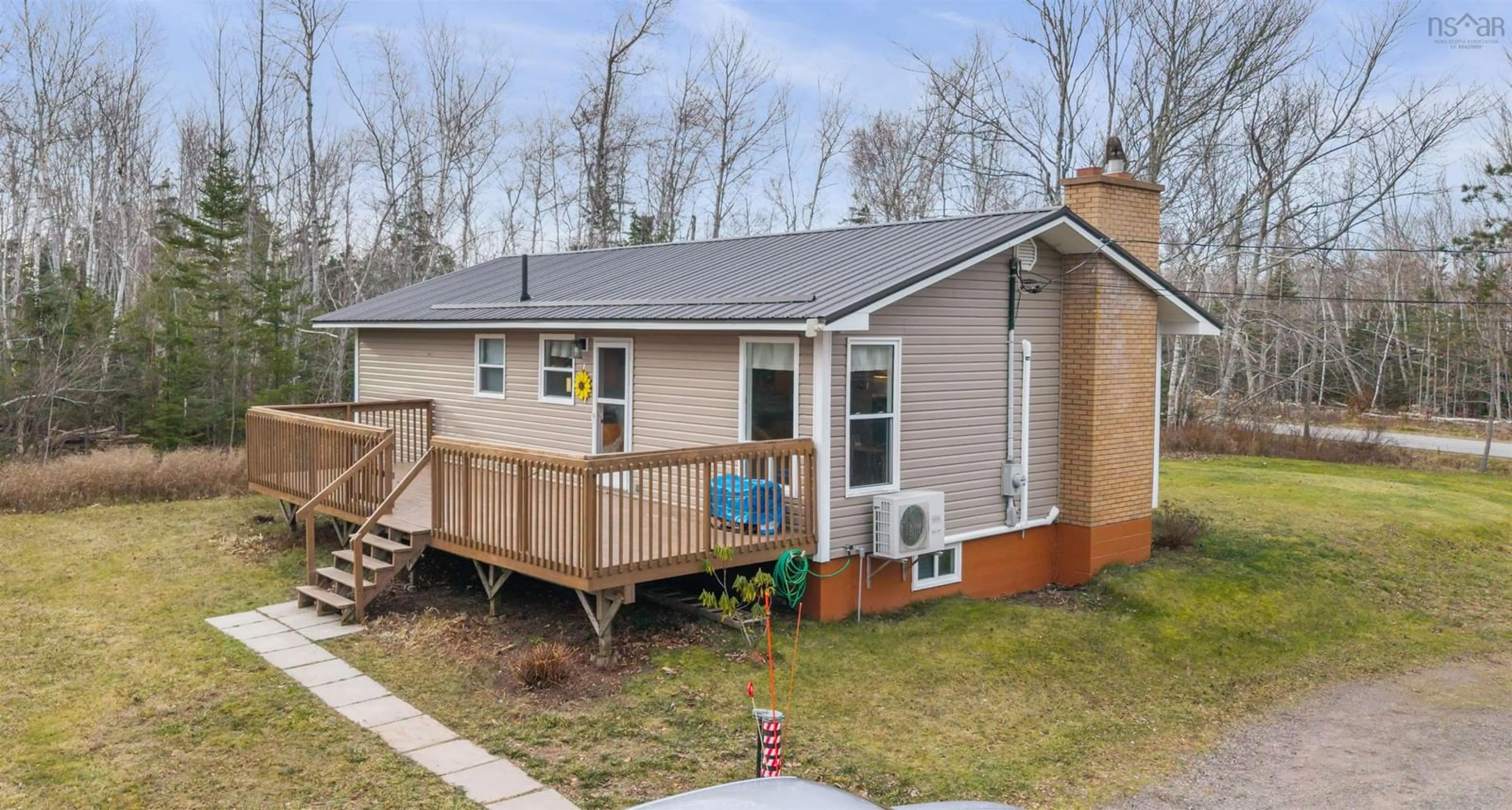 Home with vinyl exterior material, street for 1082 Alma Rd, Loch Broom Nova Scotia B0K 2A0