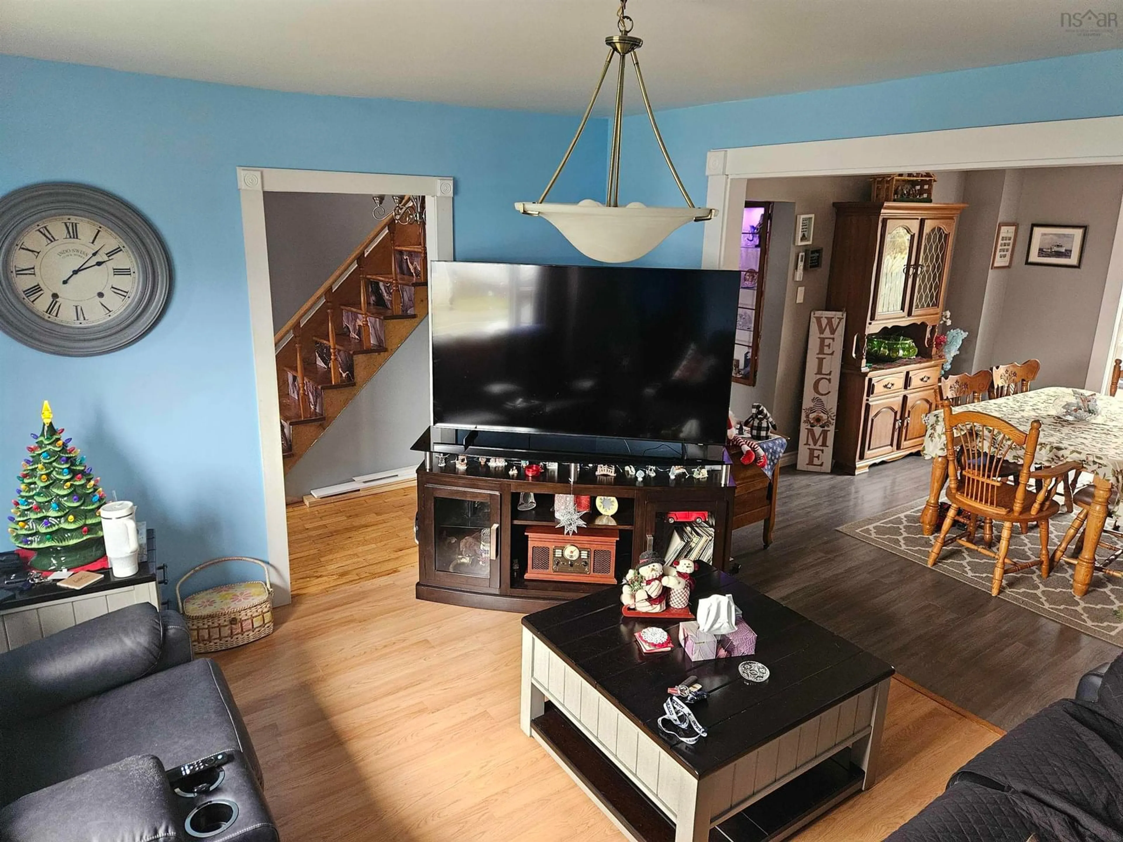 Living room with furniture, wood/laminate floor for 66 Macleod St, Sydney Nova Scotia B1N 1B3